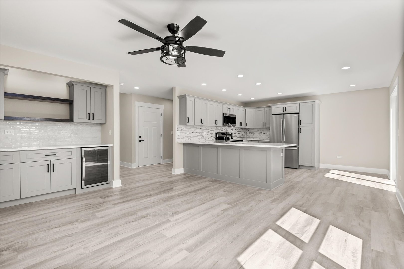 120 Kevin Drive Diamond, IL 60416 - Photo 10 of 24 a view of a kitchen with kitchen island a sink stainless steel appliances and cabinets