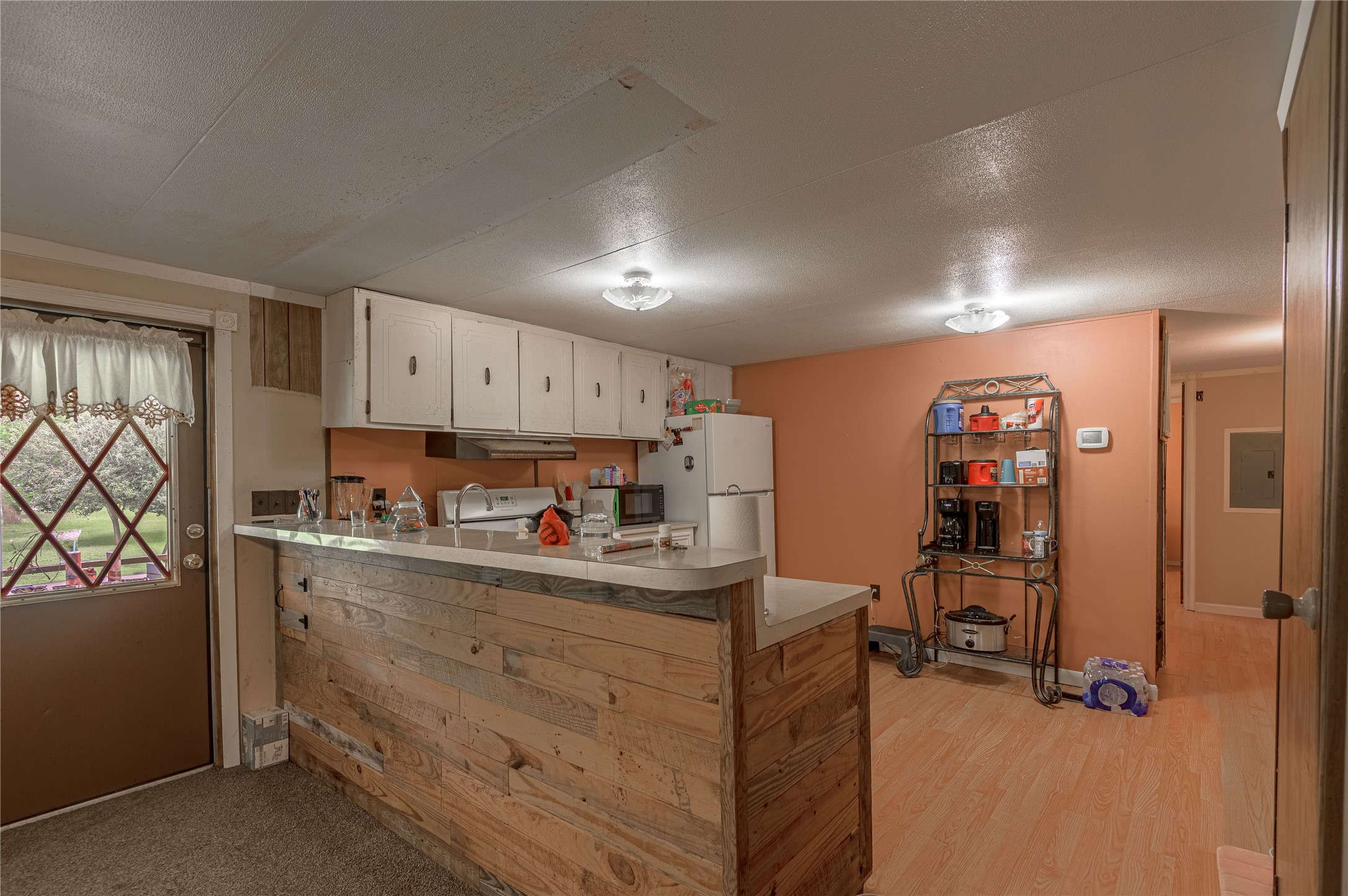 151 Moon Lake Drive Trinity, TX 75862 - Photo 11 of 46 a kitchen with stainless steel appliances a sink window and cabinets