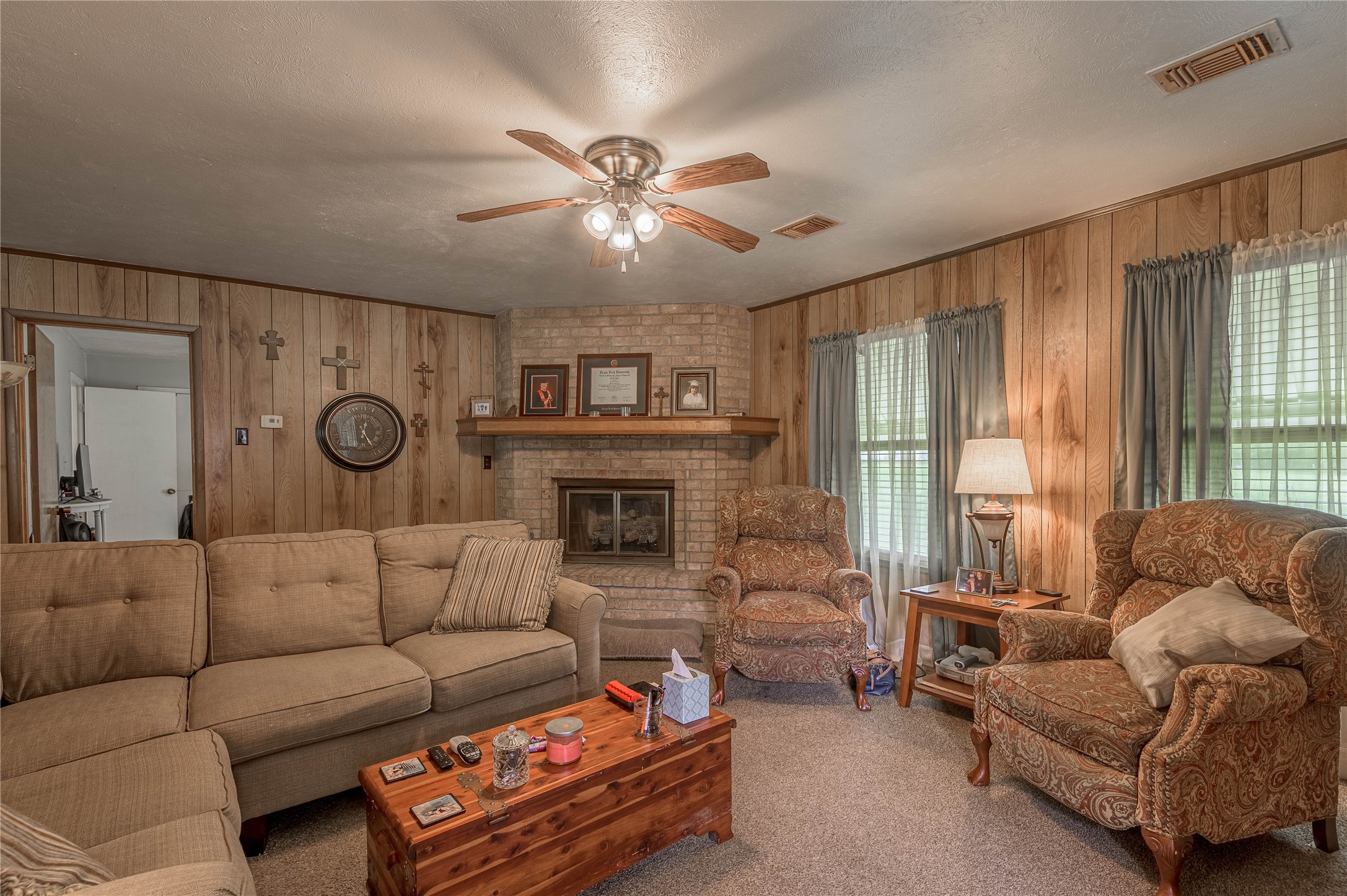 151 Moon Lake Drive Trinity, TX 75862 - Photo 18 of 46 a living room with furniture and a fireplace