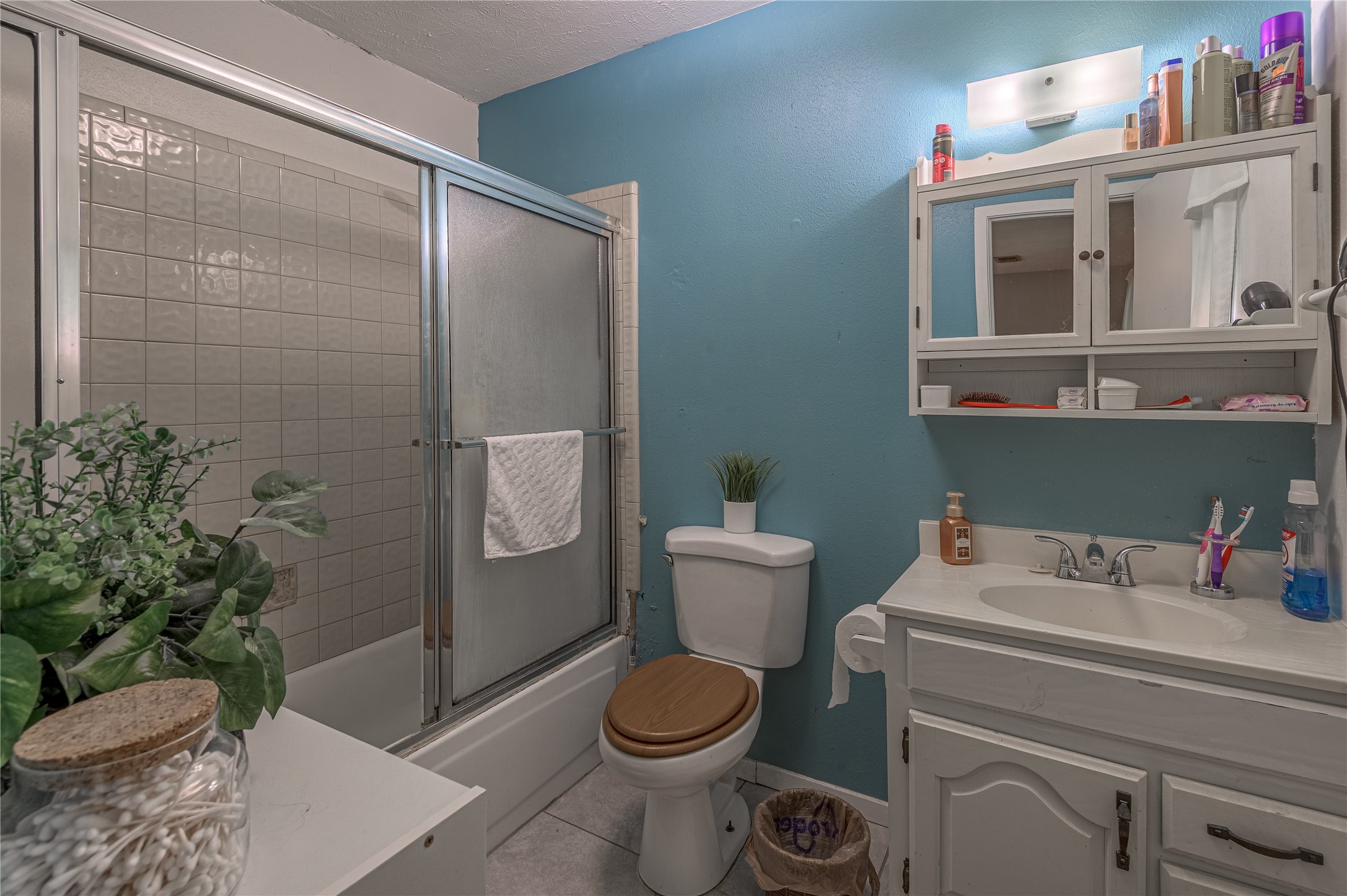 151 Moon Lake Drive Trinity, TX 75862 - Photo 23 of 46 a bathroom with a toilet sink and shower