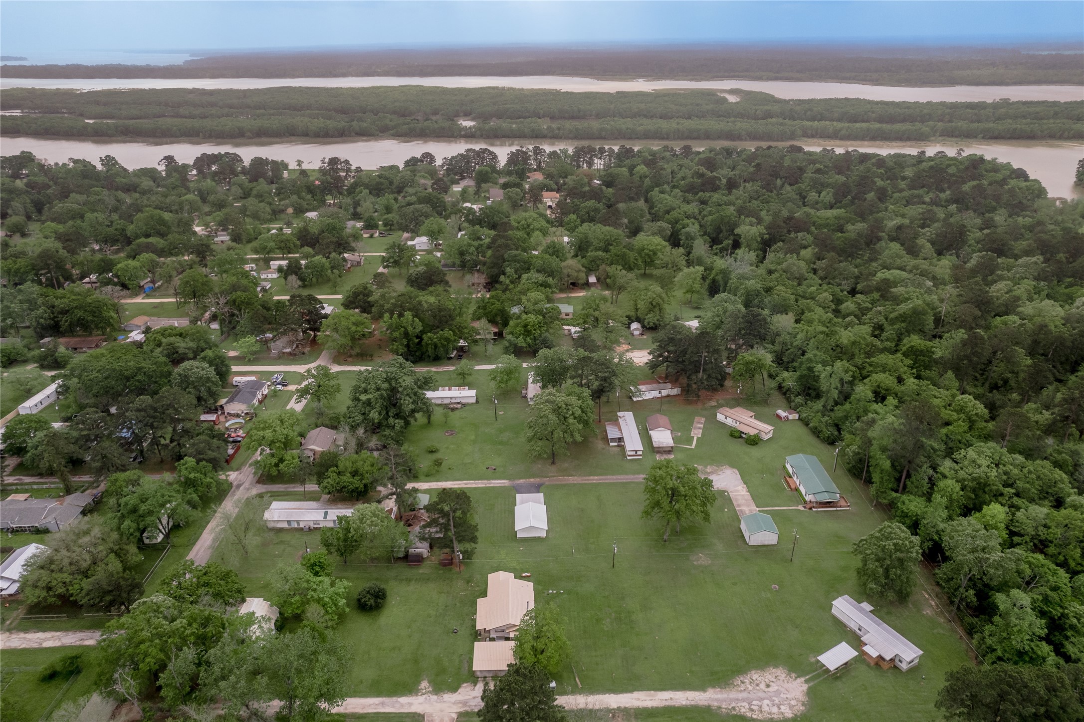 151 Moon Lake Drive Trinity, TX 75862 - Photo 37 of 46 an aerial view of residential houses with outdoor space