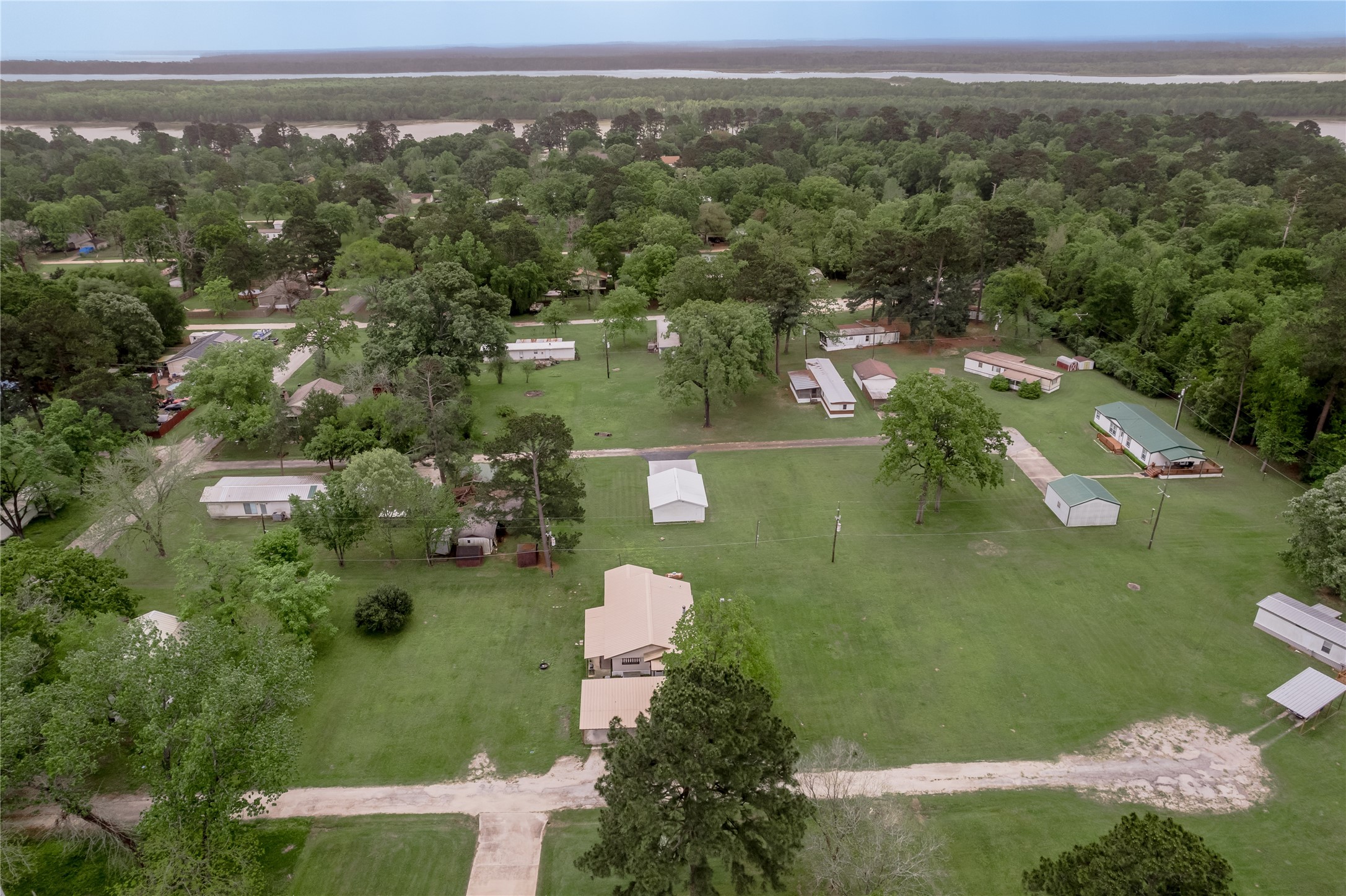 151 Moon Lake Drive Trinity, TX 75862 - Photo 38 of 46 an aerial view of a house with a yard