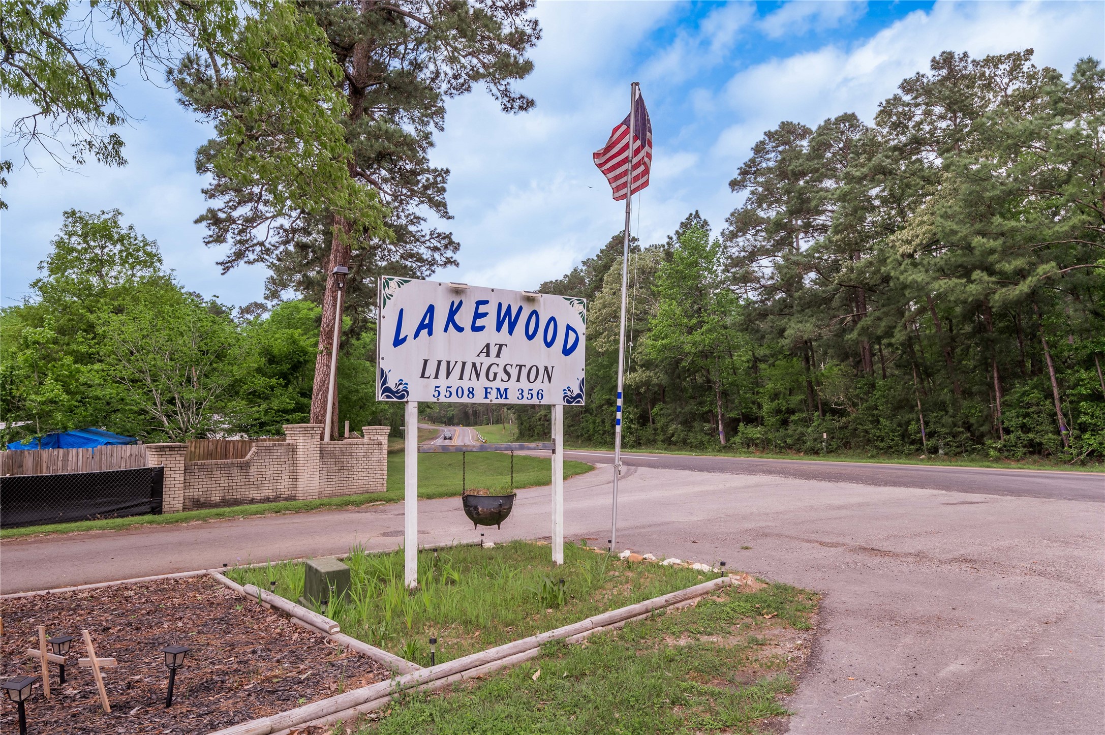 151 Moon Lake Drive Trinity, TX 75862 - Photo 45 of 46 a sign that is on a brick wall