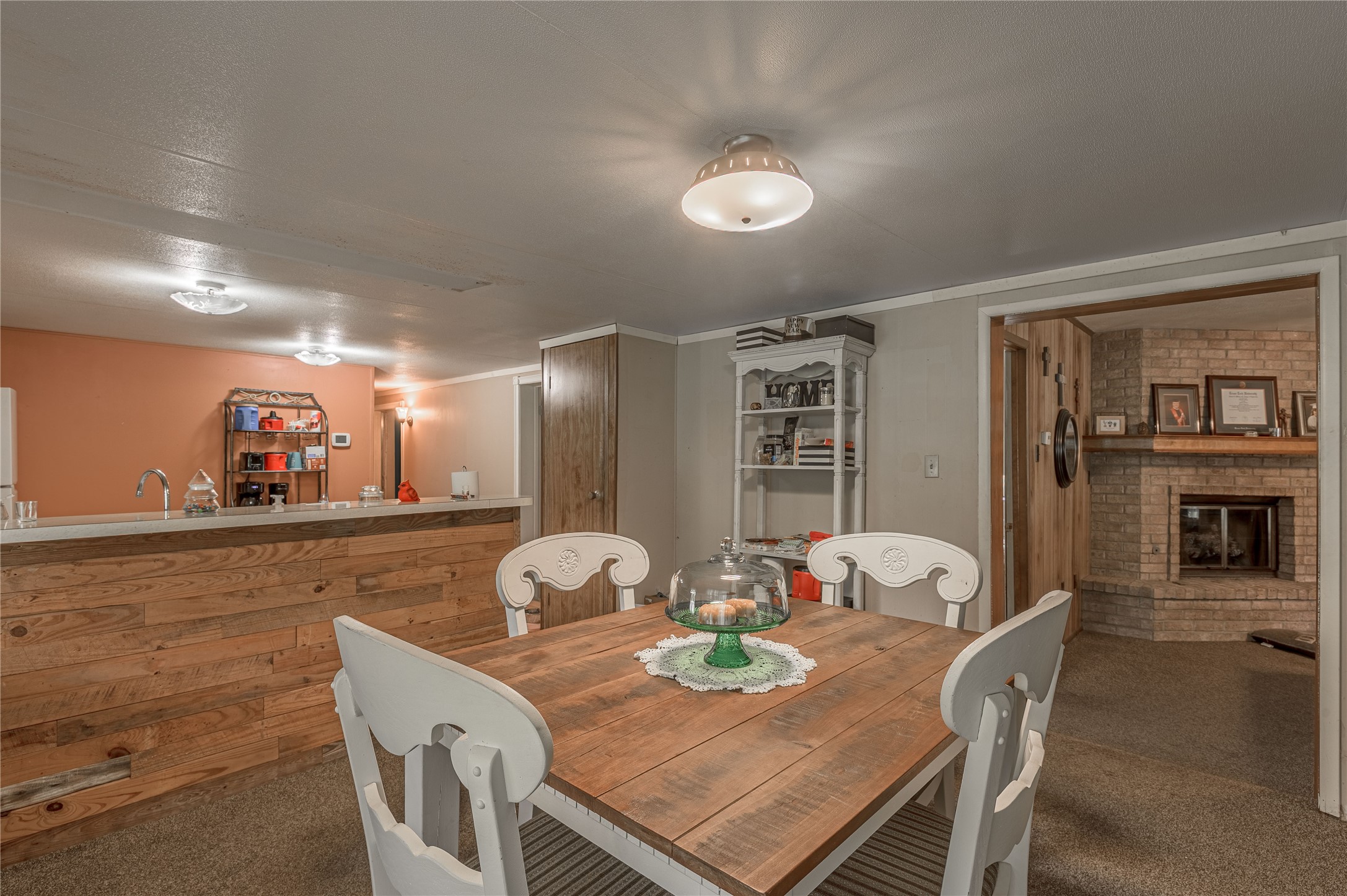 151 Moon Lake Drive Trinity, TX 75862 - Photo 9 of 46 a view of a dining room with furniture and wooden floor