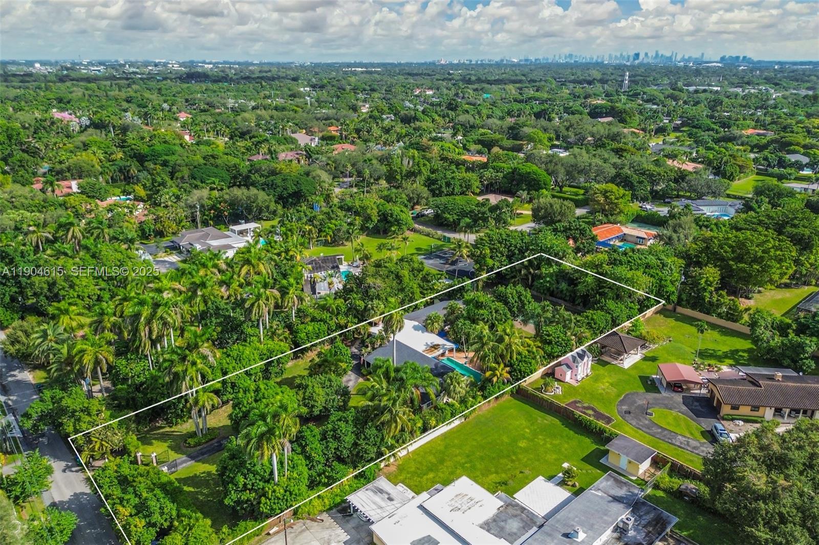 7701 Southwest 79th Court Miami, FL 33143 - Photo 8 of 10 a view of a city