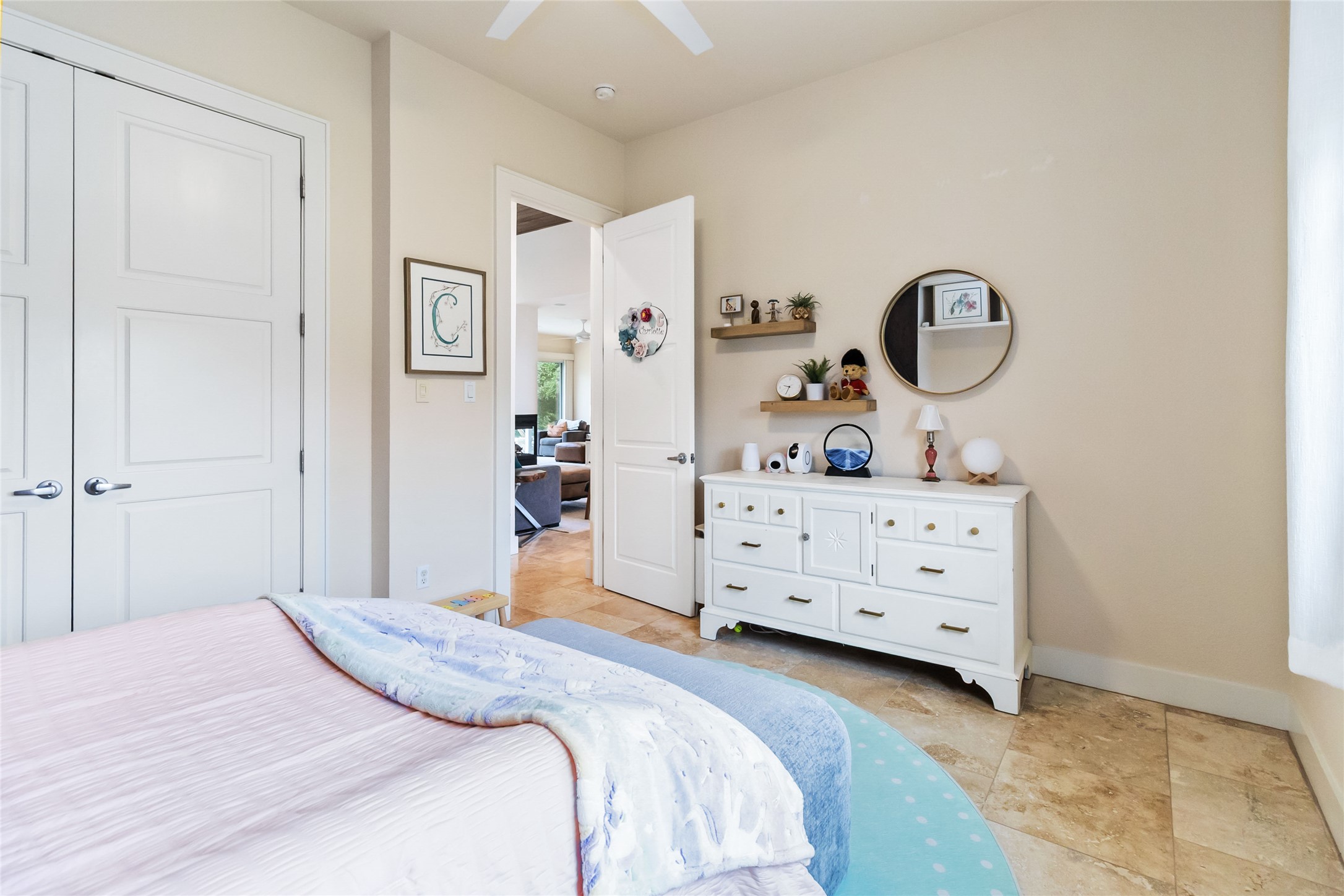 129 Powder Horn Road Bastrop, TX 78602 - Photo 18 of 27 Bedroom featuring a ceiling fan and a closet