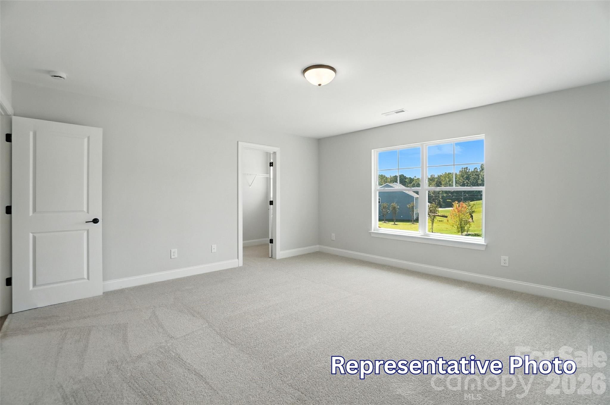 10818 Coble Road Mint Hill, NC 28227 - Photo 36 of 38 a view of an empty room with a window