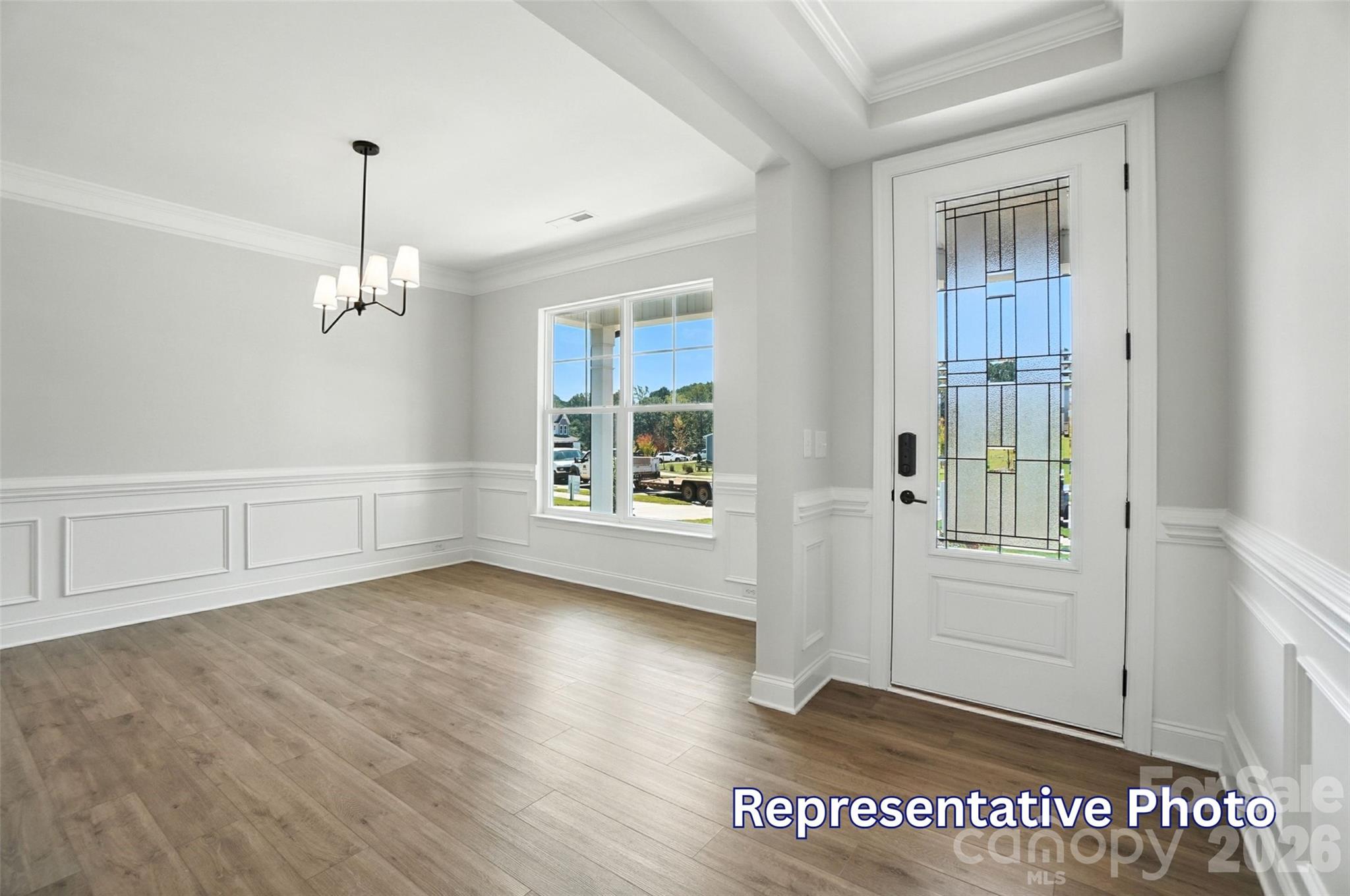 10818 Coble Road Mint Hill, NC 28227 - Photo 8 of 38 wooden floor in an empty room with a window