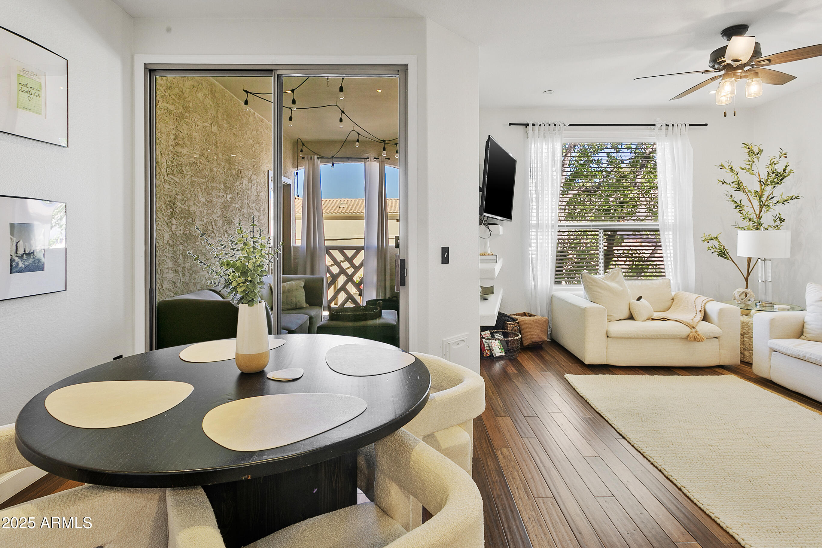 9550 East Thunderbird Road, Unit 228 Scottsdale, AZ 85260 - Photo 11 of 29 a living room with furniture and a large window