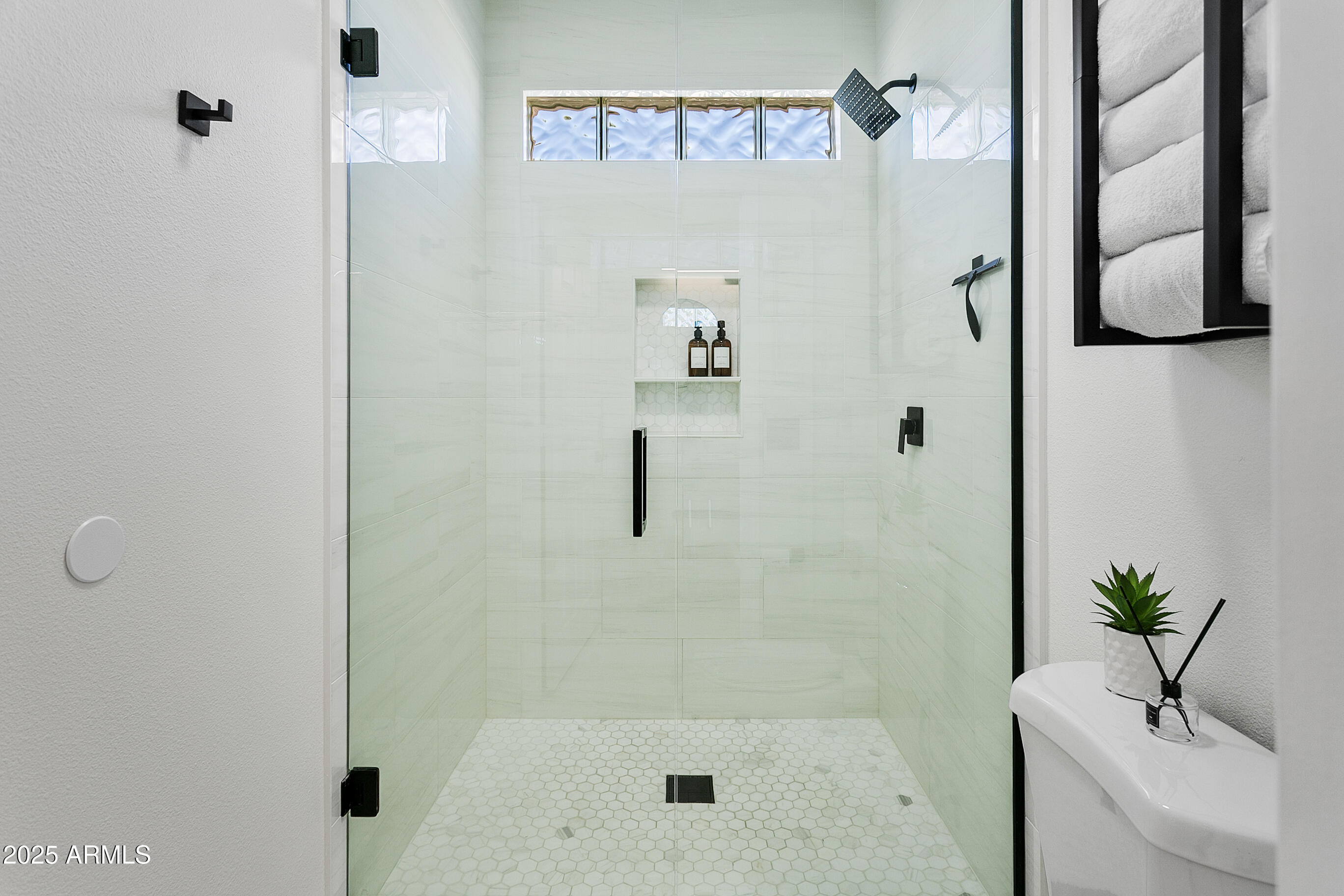 9550 East Thunderbird Road, Unit 228 Scottsdale, AZ 85260 - Photo 17 of 29 a bathroom with a shower