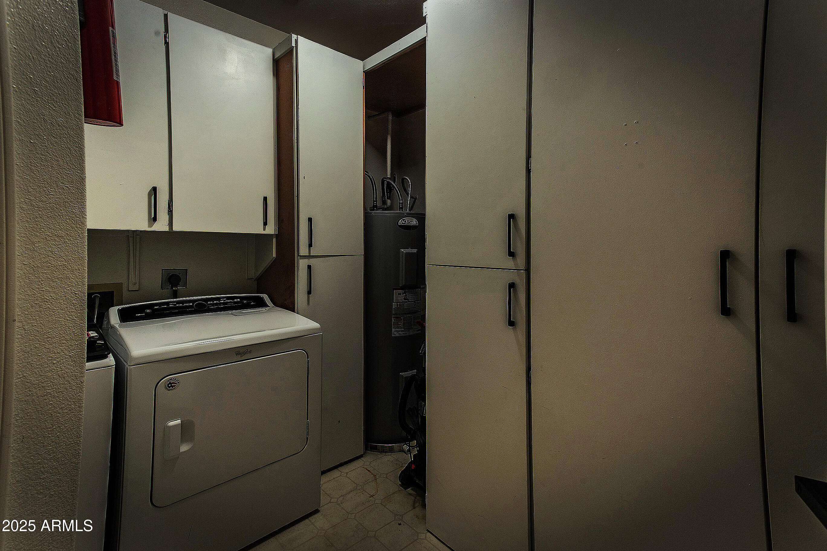 9550 East Thunderbird Road, Unit 228 Scottsdale, AZ 85260 - Photo 19 of 29 a view of storage and utility room with washer and dryer