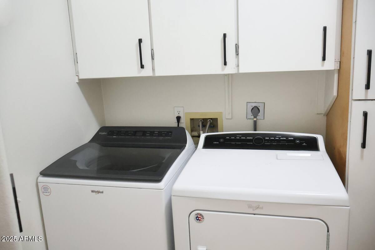 9550 East Thunderbird Road, Unit 228 Scottsdale, AZ 85260 - Photo 20 of 29 a stove top oven sitting inside of a kitchen