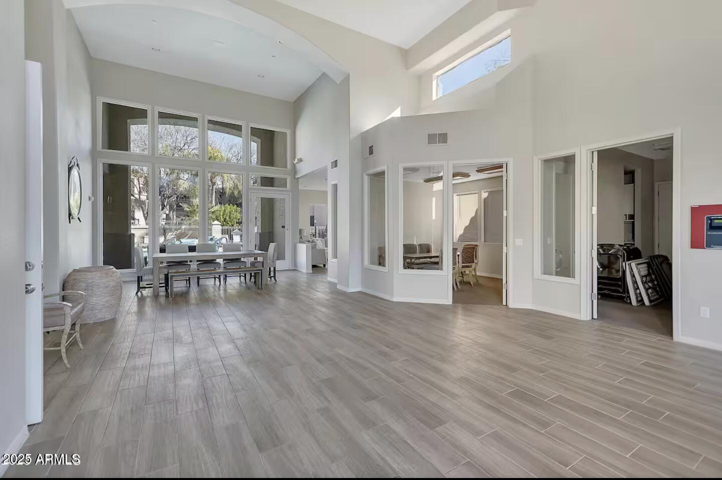 9550 East Thunderbird Road, Unit 228 Scottsdale, AZ 85260 - Photo 27 of 29 a view of a livingroom with furniture wooden floor and a rug