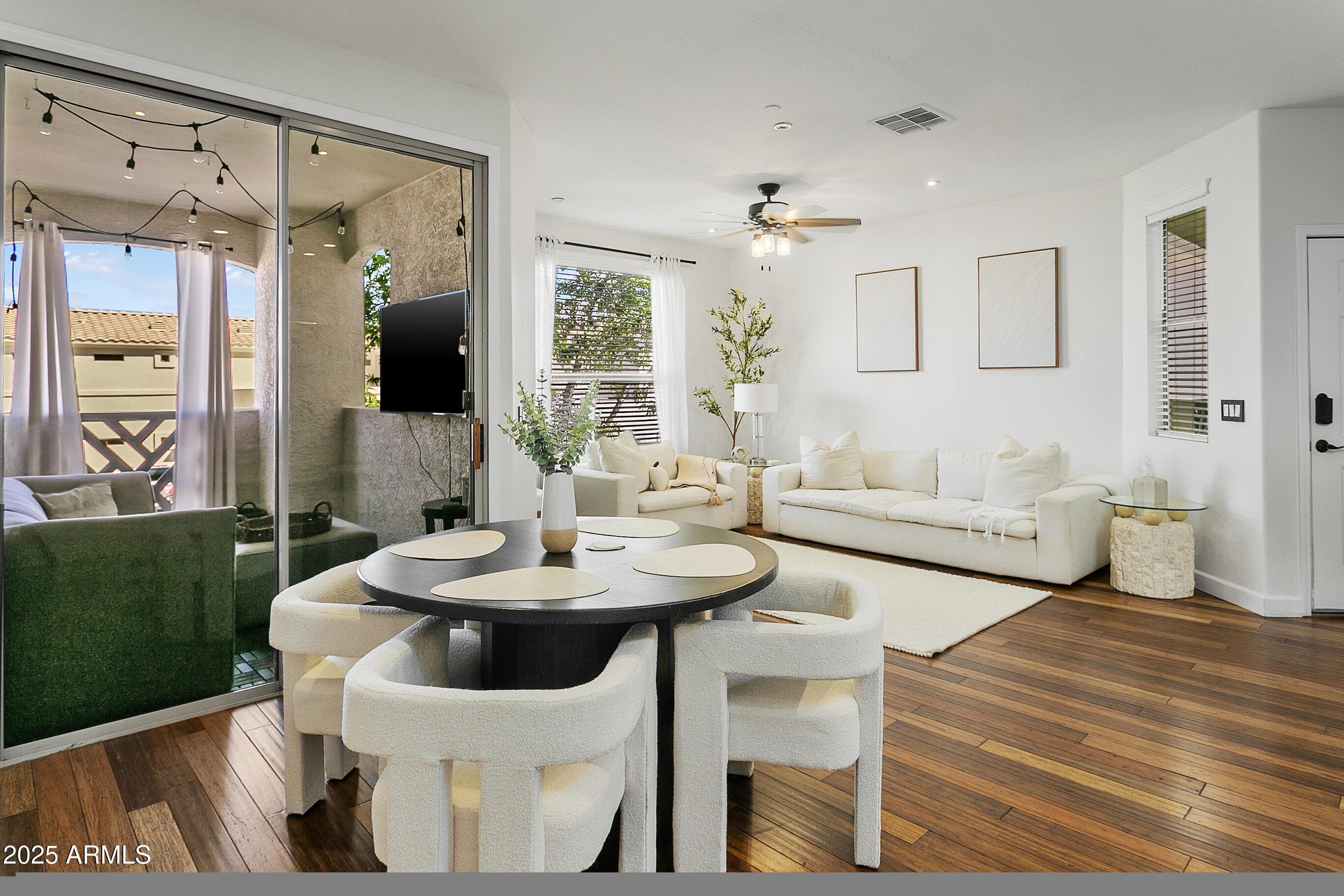 9550 East Thunderbird Road, Unit 228 Scottsdale, AZ 85260 - Photo 4 of 29 a living room with furniture and a large window