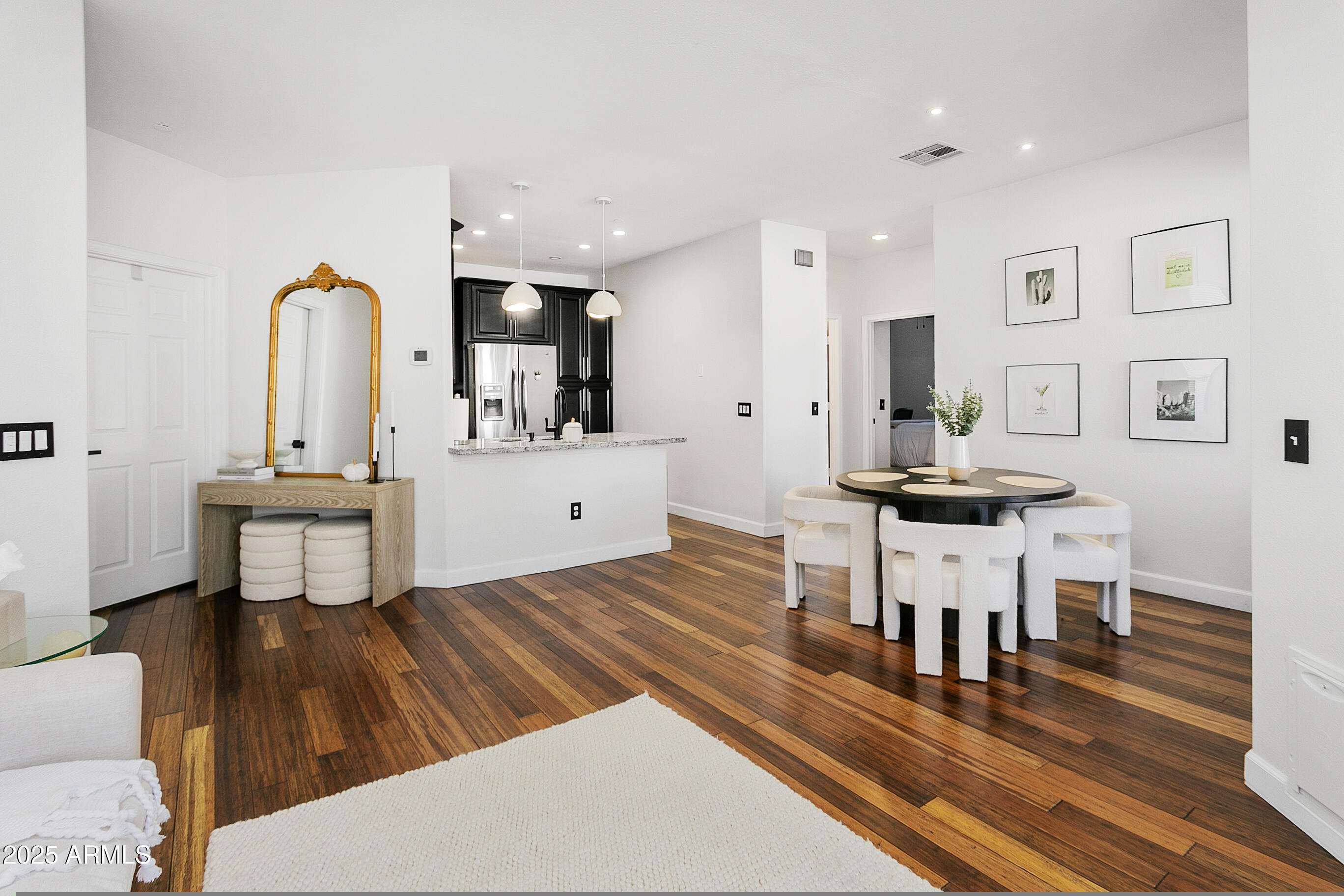 9550 East Thunderbird Road, Unit 228 Scottsdale, AZ 85260 - Photo 5 of 29 a living room with furniture and wooden floor