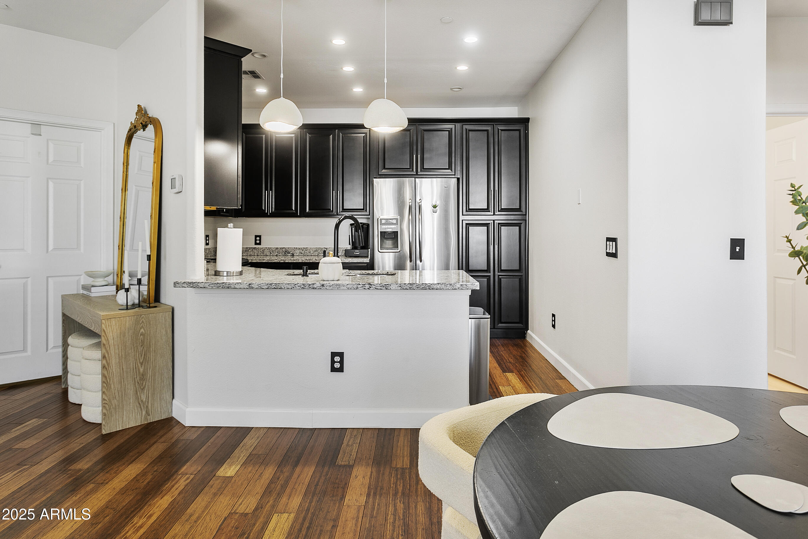 9550 East Thunderbird Road, Unit 228 Scottsdale, AZ 85260 - Photo 6 of 29 a bathroom with a sink mirror and toilet