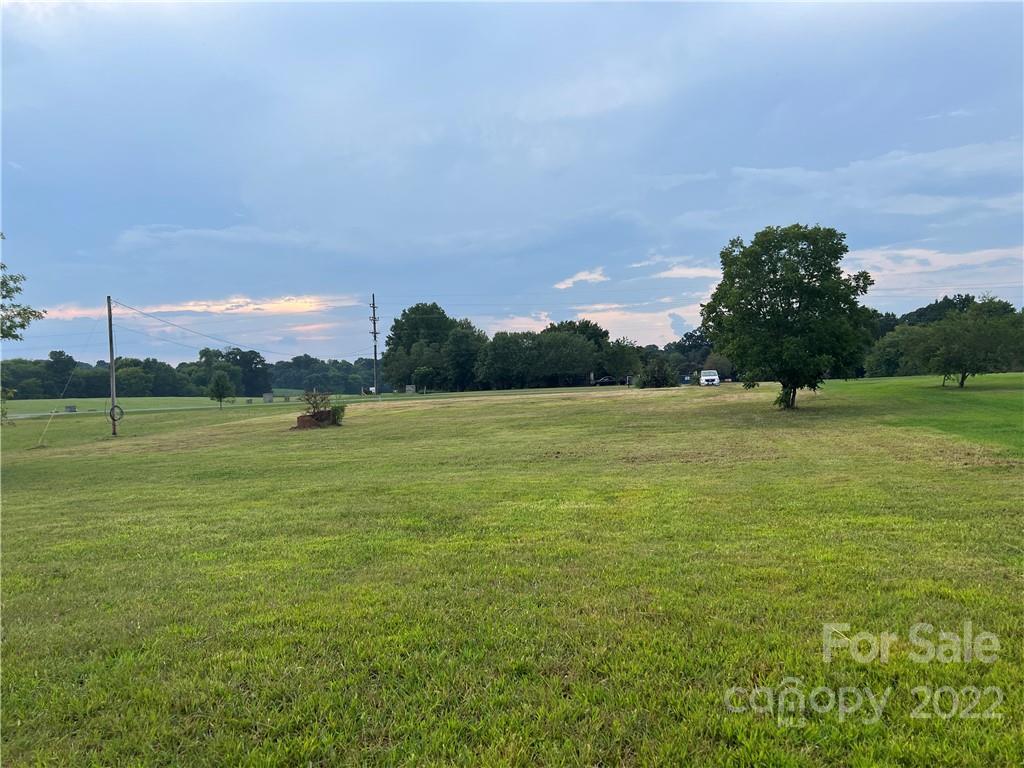 2421 Long Hope Road Monroe, NC 28112 - Photo 13 of 14 a view of a field with an ocean