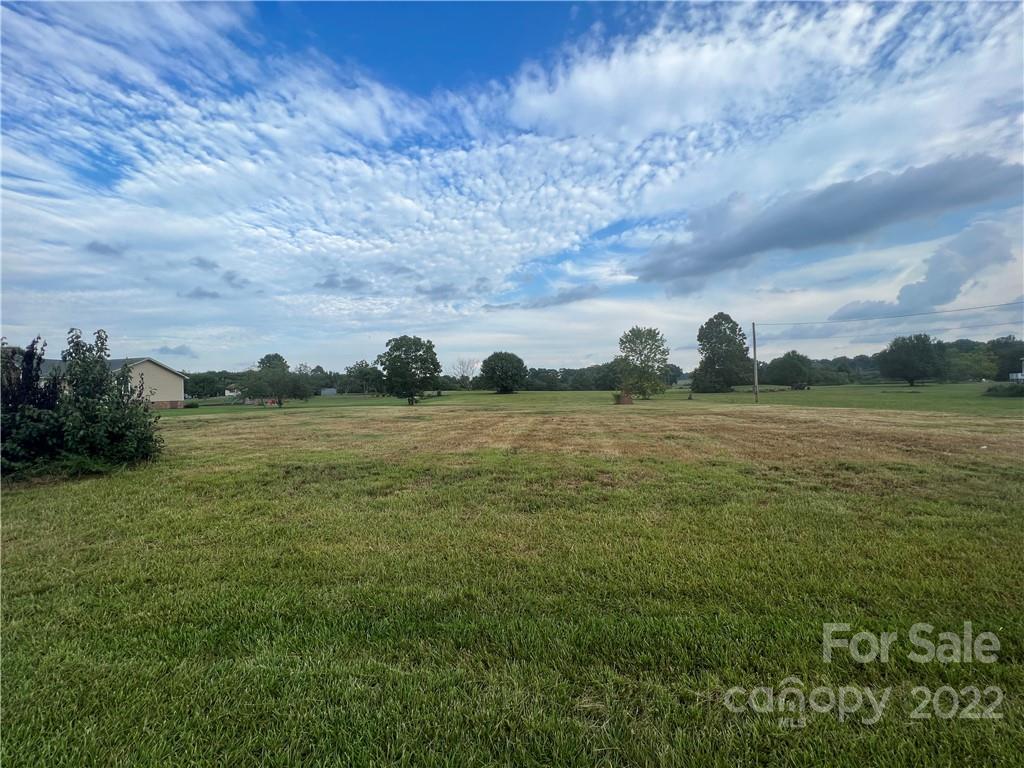 2421 Long Hope Road Monroe, NC 28112 - Photo 3 of 14 a view of a lake with houses in the back
