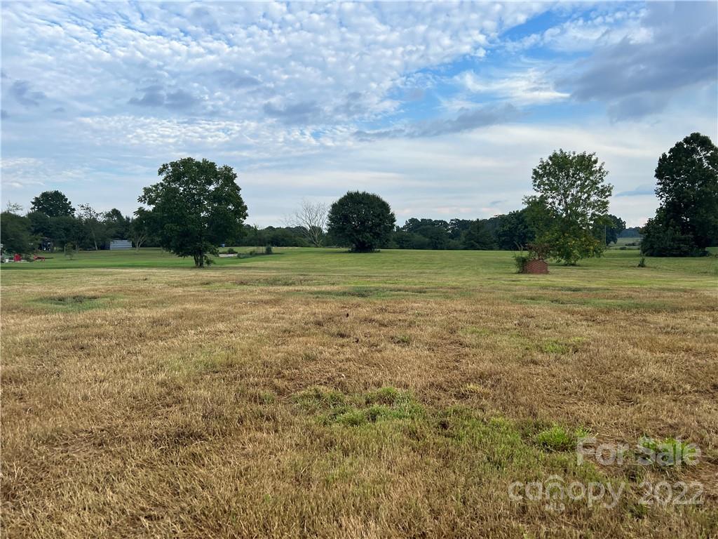 2421 Long Hope Road Monroe, NC 28112 - Photo 4 of 14 a view of a field with an ocean