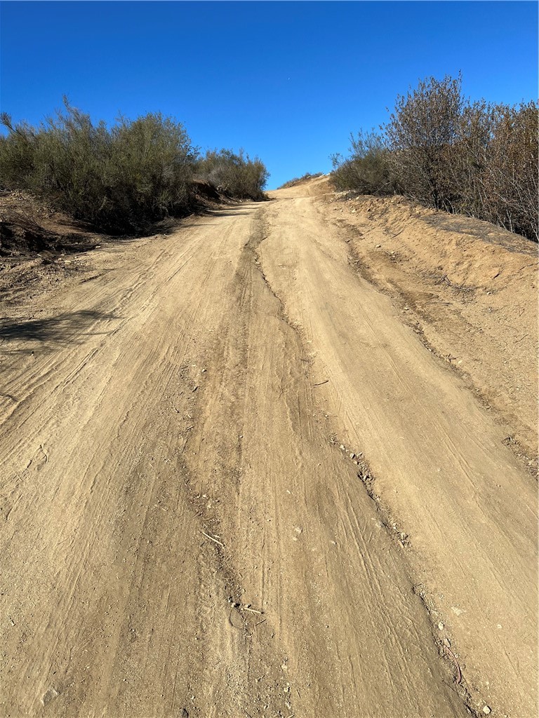 0 Vista Suelto Road Moreno Valley, CA 92555 - Photo 8 of 8 a view of a snow on the side of the road