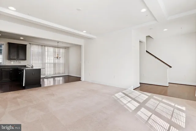 a view of a livingroom with a kitchen