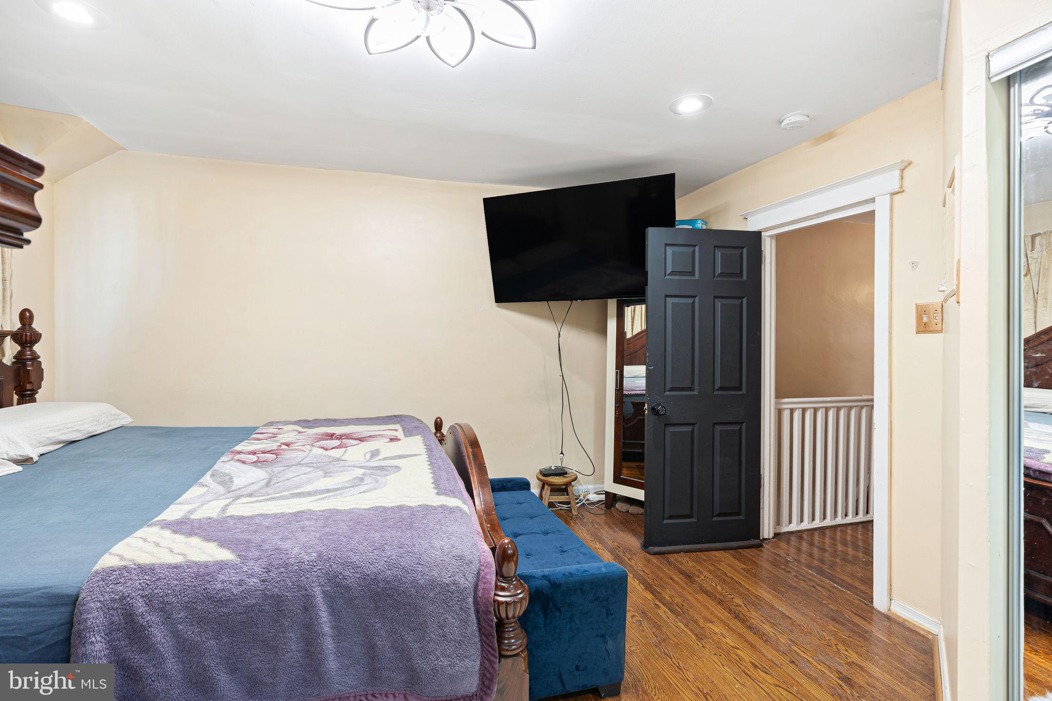 144 Fairview Avenue Lansdowne, PA 19050 - Photo 16 of 39 a bedroom with a bed and a flat screen tv