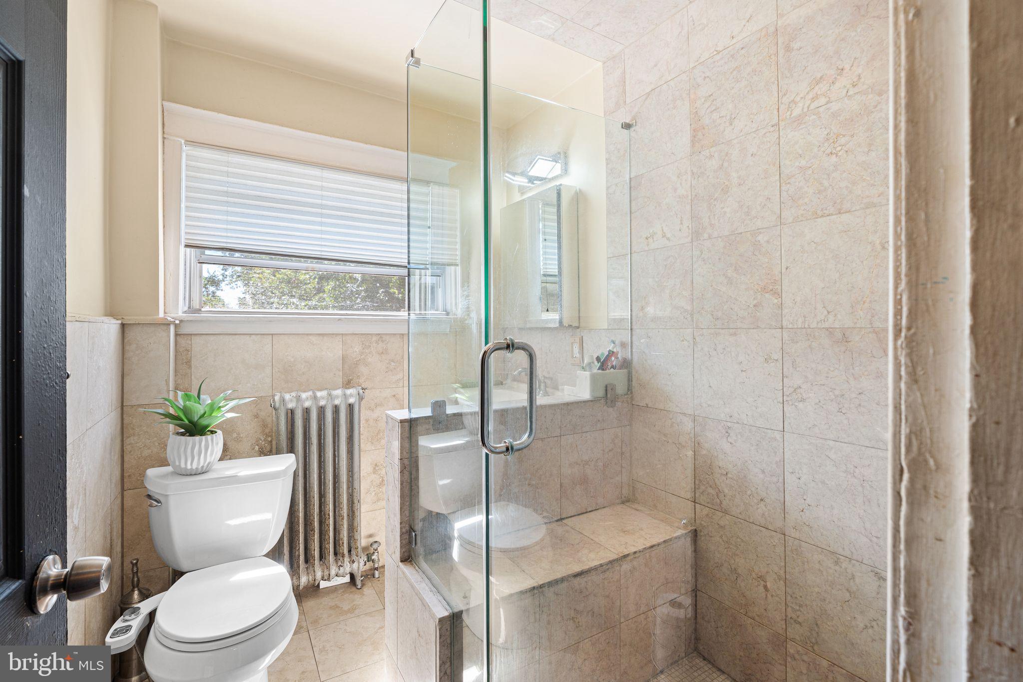 144 Fairview Avenue Lansdowne, PA 19050 - Photo 18 of 39 a bathroom with a toilet a sink and tub