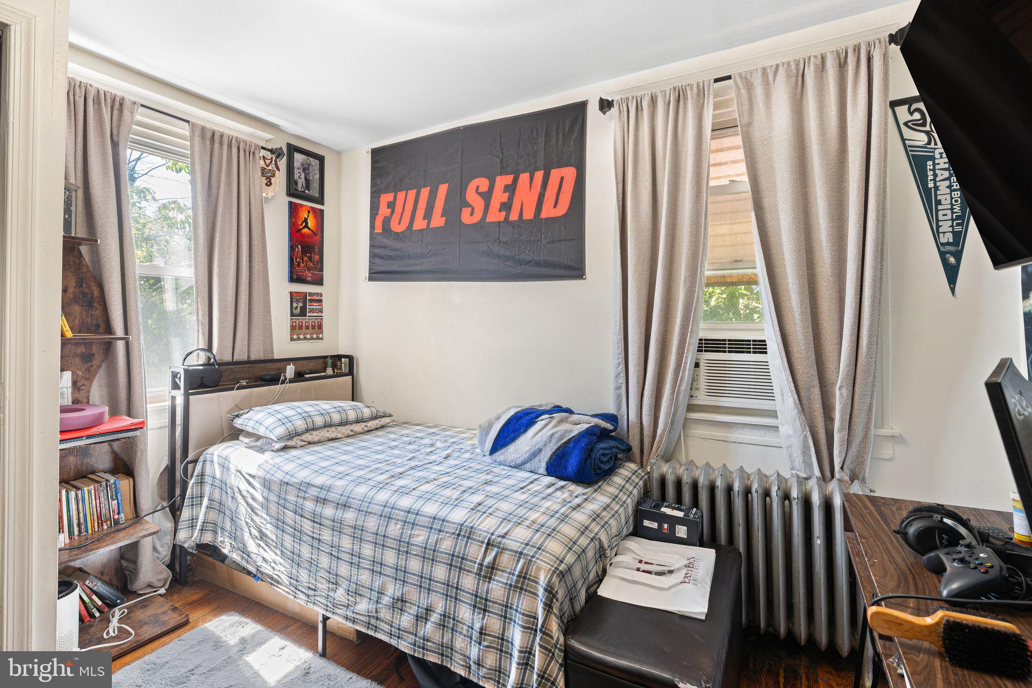 144 Fairview Avenue Lansdowne, PA 19050 - Photo 21 of 39 a bedroom with a bed and a window