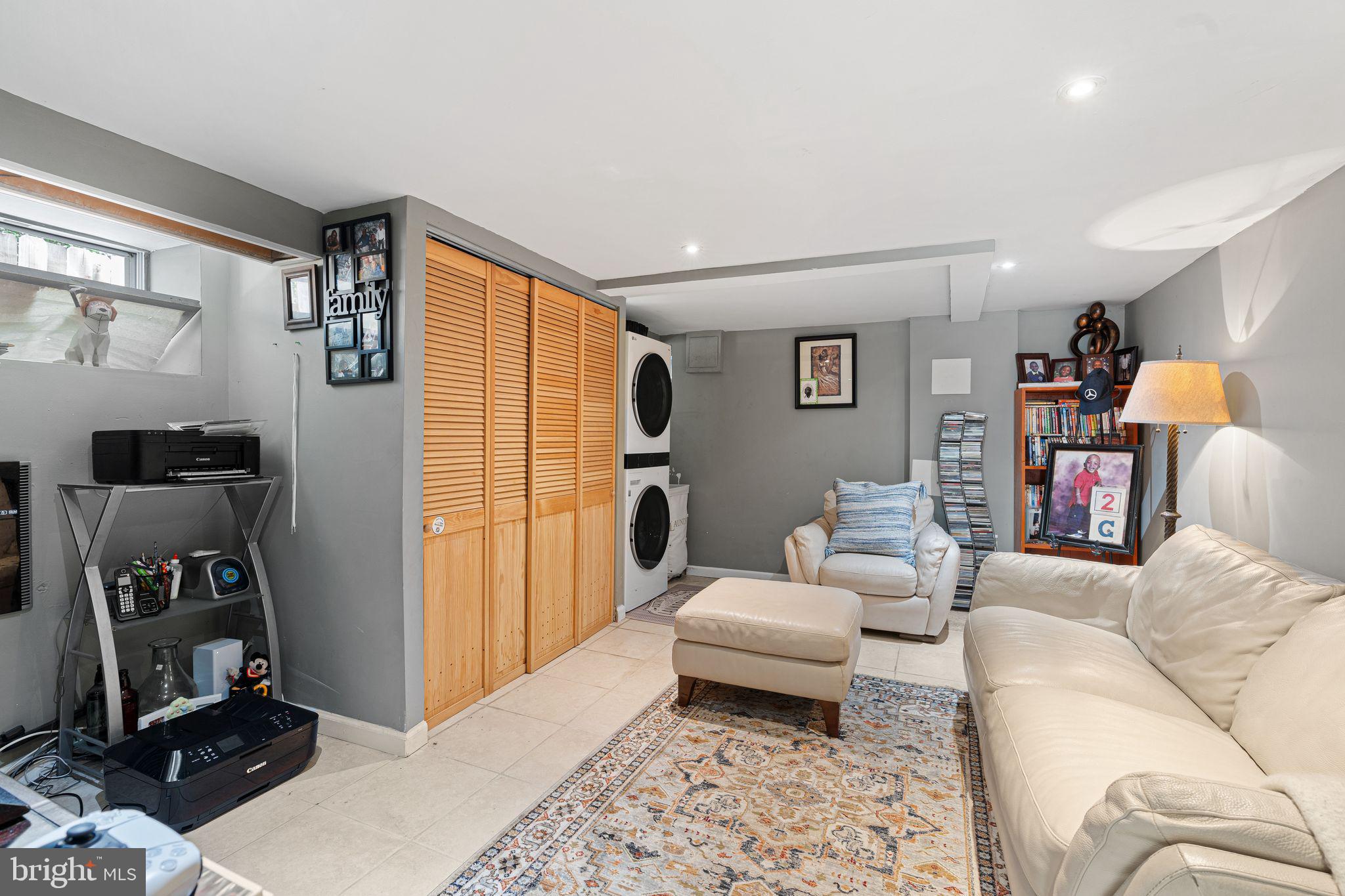 144 Fairview Avenue Lansdowne, PA 19050 - Photo 24 of 39 a living room with furniture and a wooden floor