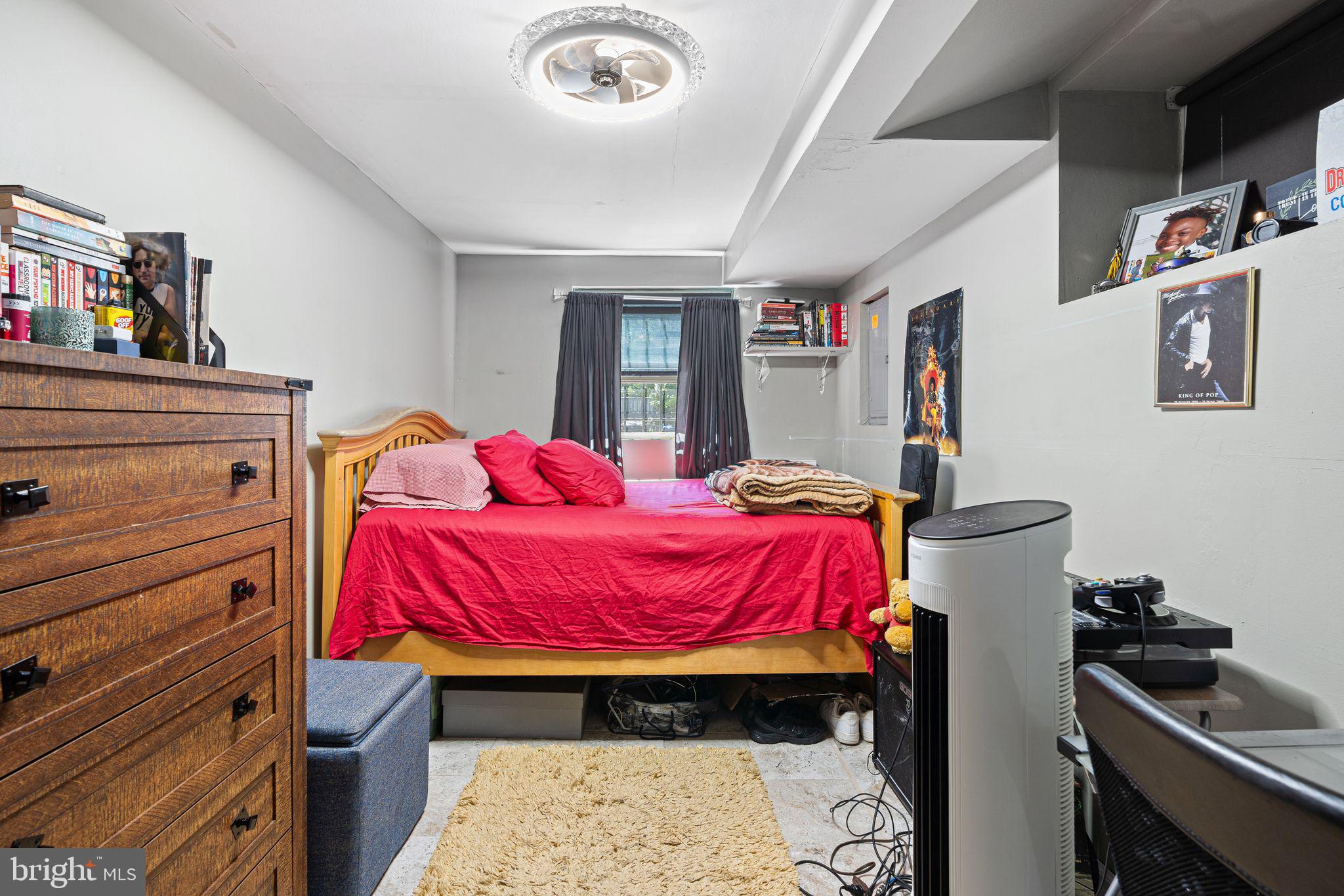 144 Fairview Avenue Lansdowne, PA 19050 - Photo 25 of 39 a bedroom with a bed and dresser