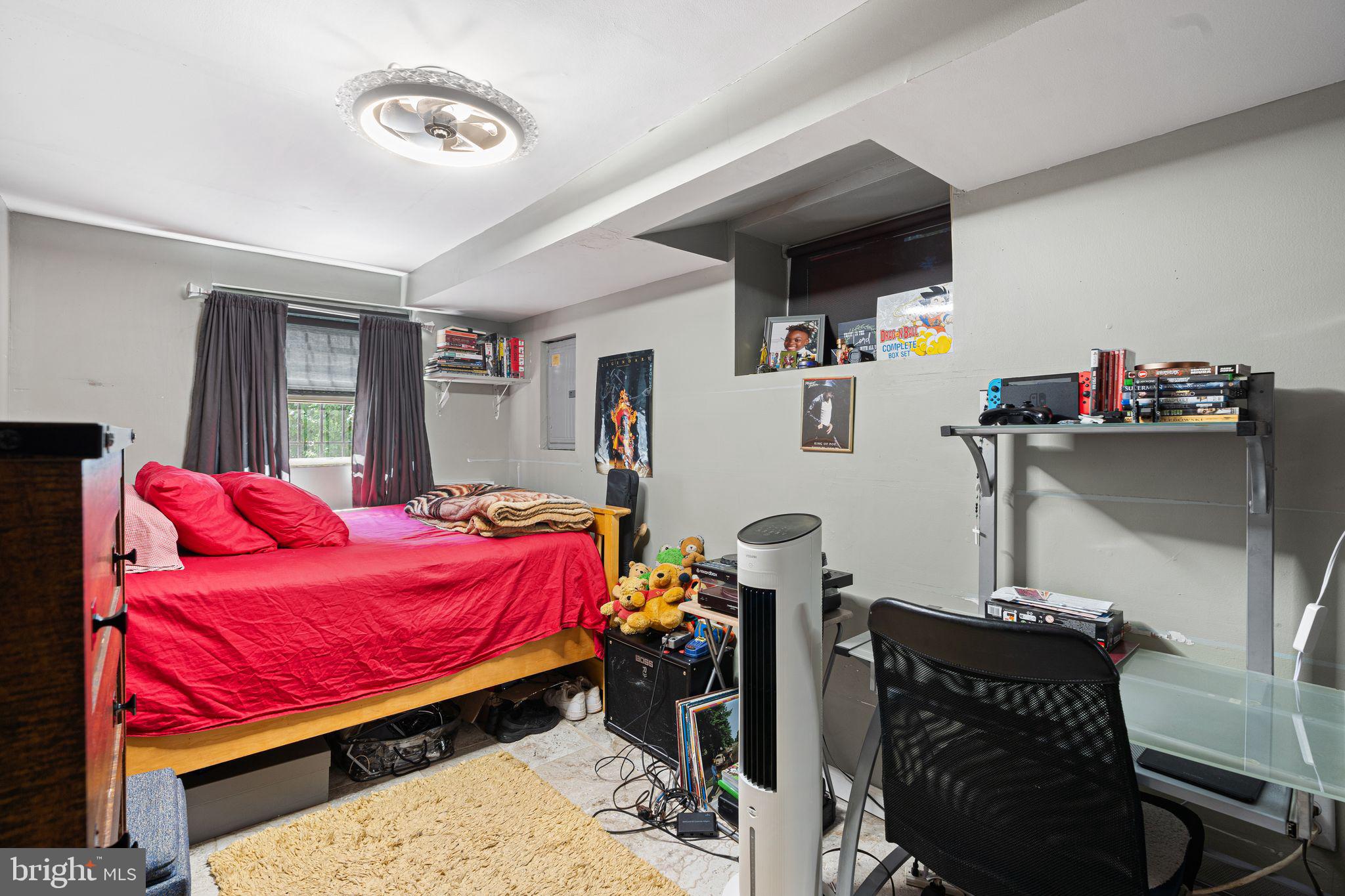 144 Fairview Avenue Lansdowne, PA 19050 - Photo 26 of 39 a bedroom with furniture and a flat screen tv