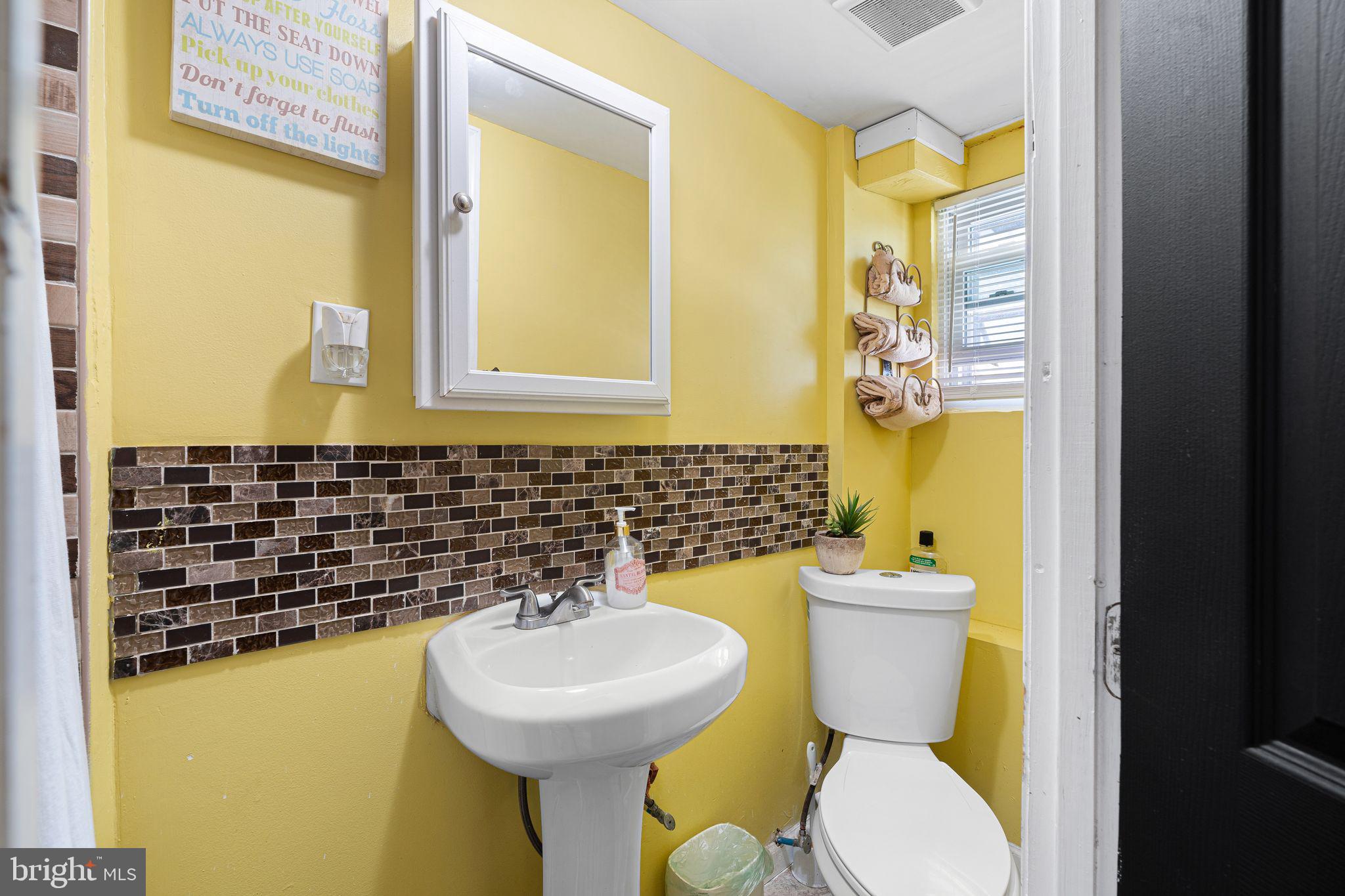 144 Fairview Avenue Lansdowne, PA 19050 - Photo 28 of 39 a bathroom with a sink and a toilet