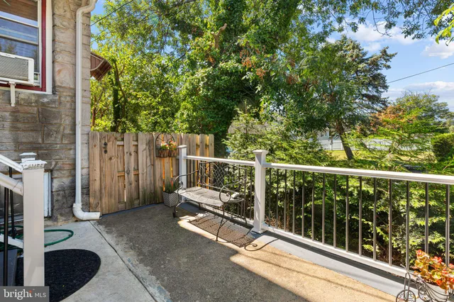 a view of a deck with a backyard