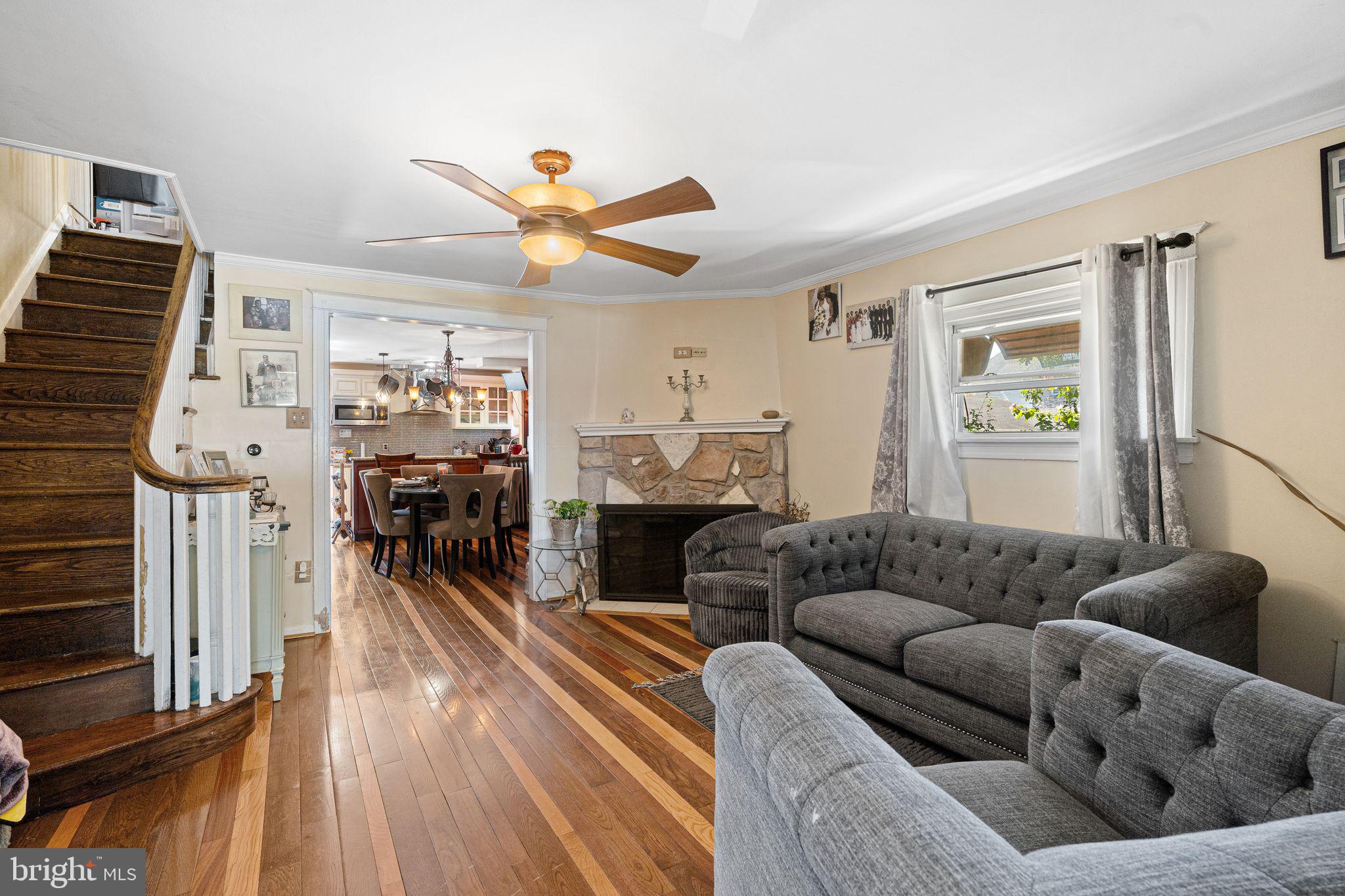 144 Fairview Avenue Lansdowne, PA 19050 - Photo 6 of 39 a living room with furniture and a wooden floor