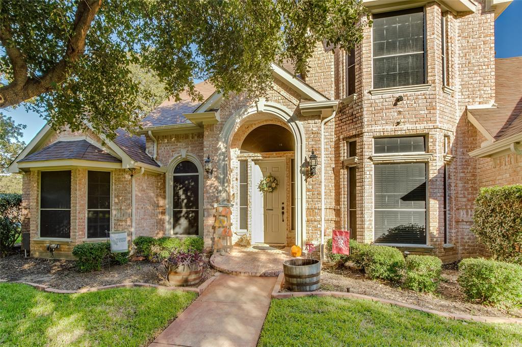 4012 Dendron Drive Flower Mound, TX 75028 - Photo 1 of 1 a front view of a house with garden