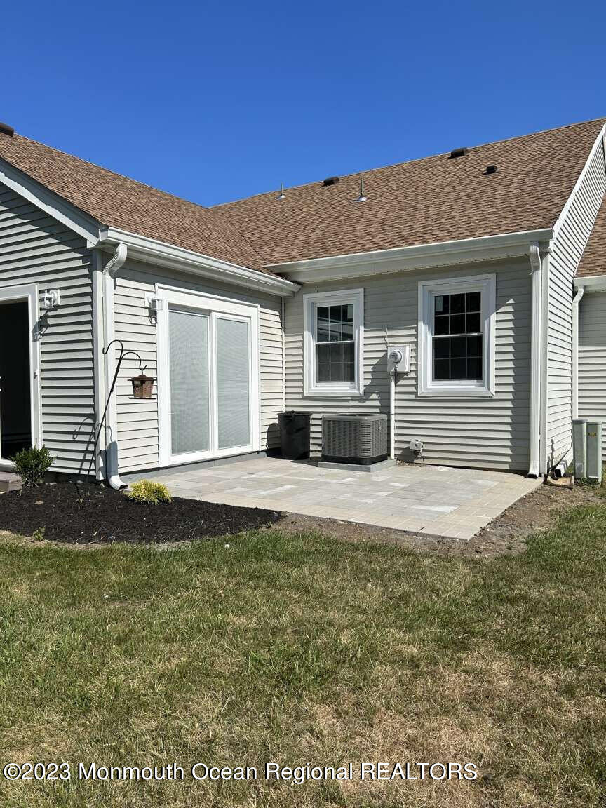 48 East Piazza Tasso Freehold, NJ 07728 - Photo 16 of 21 a house view with a garden space