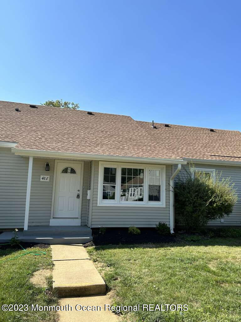 48 East Piazza Tasso Freehold, NJ 07728 - Photo 21 of 21 front view of a house with yard