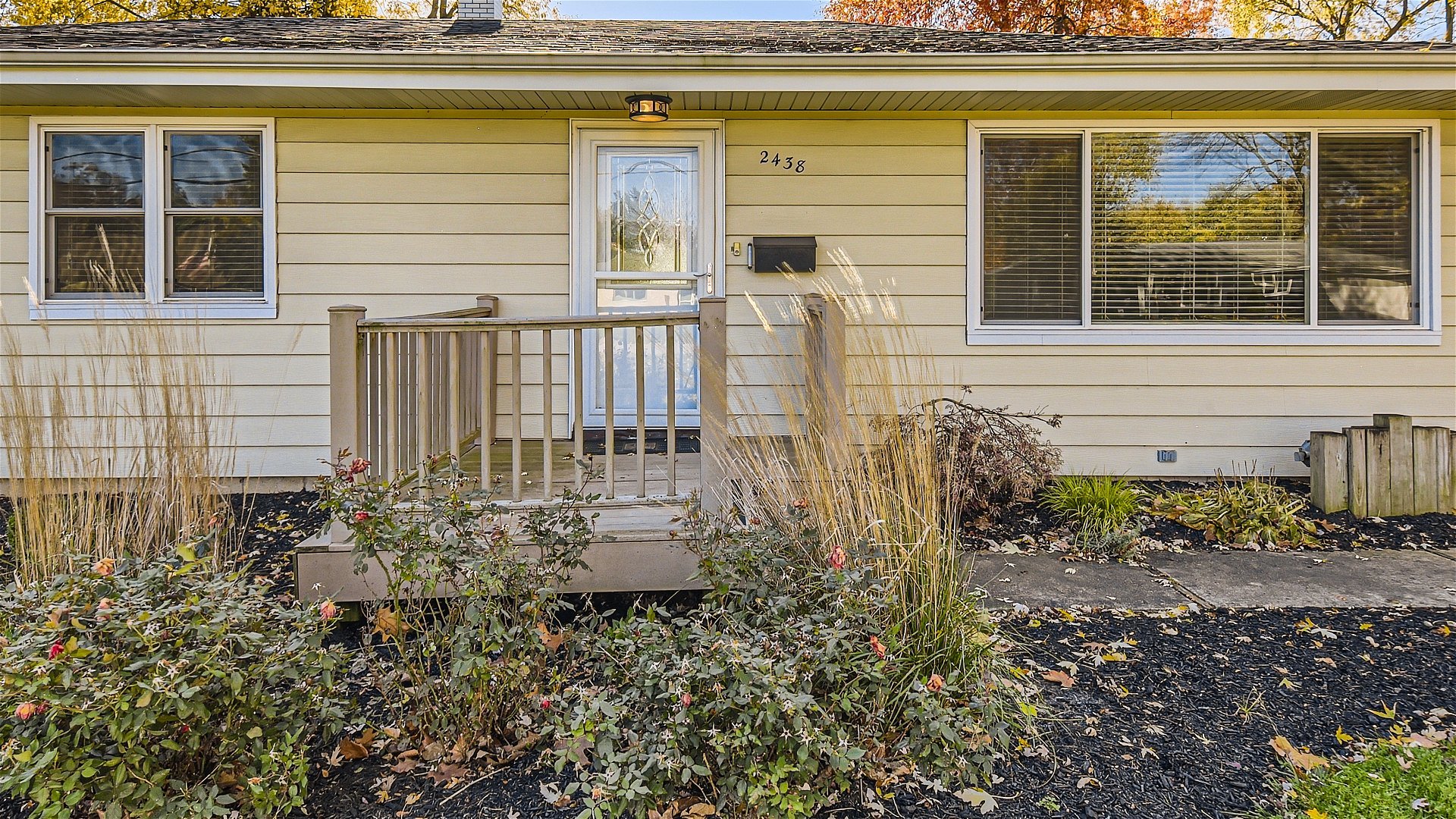 2438 Erskine Road Joliet, IL 60433 - Photo 2 of 42 a front view of a house with a yard