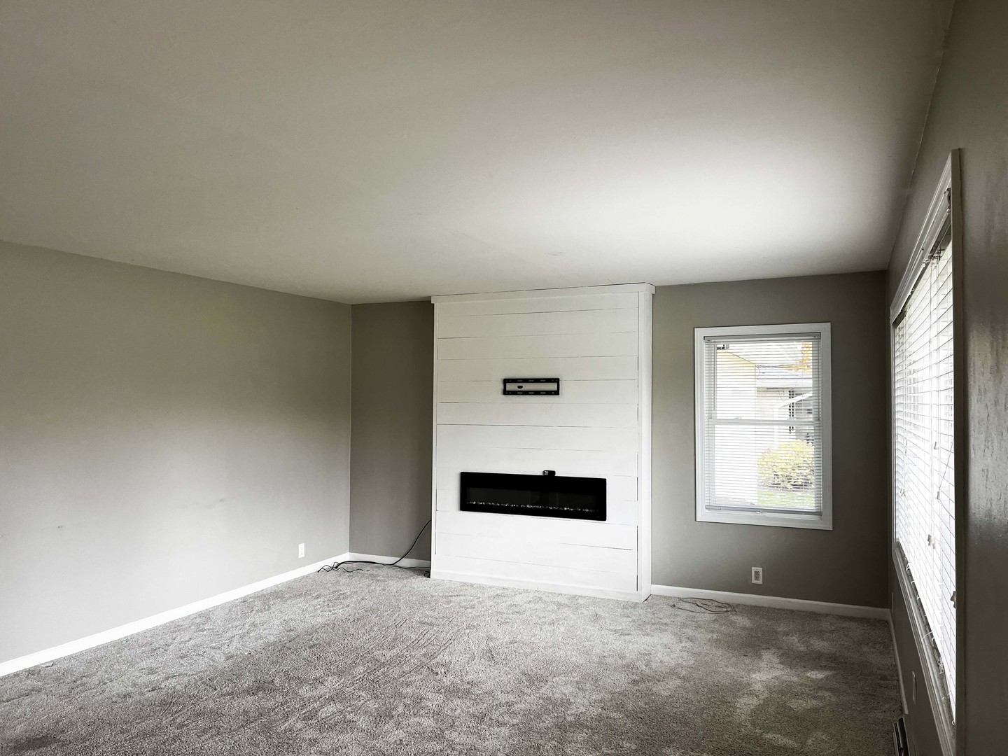 2438 Erskine Road Joliet, IL 60433 - Photo 22 of 42 a view of an empty room with a window