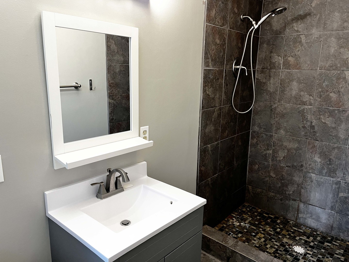2438 Erskine Road Joliet, IL 60433 - Photo 33 of 42 a bathroom with a sink a toilet and shower