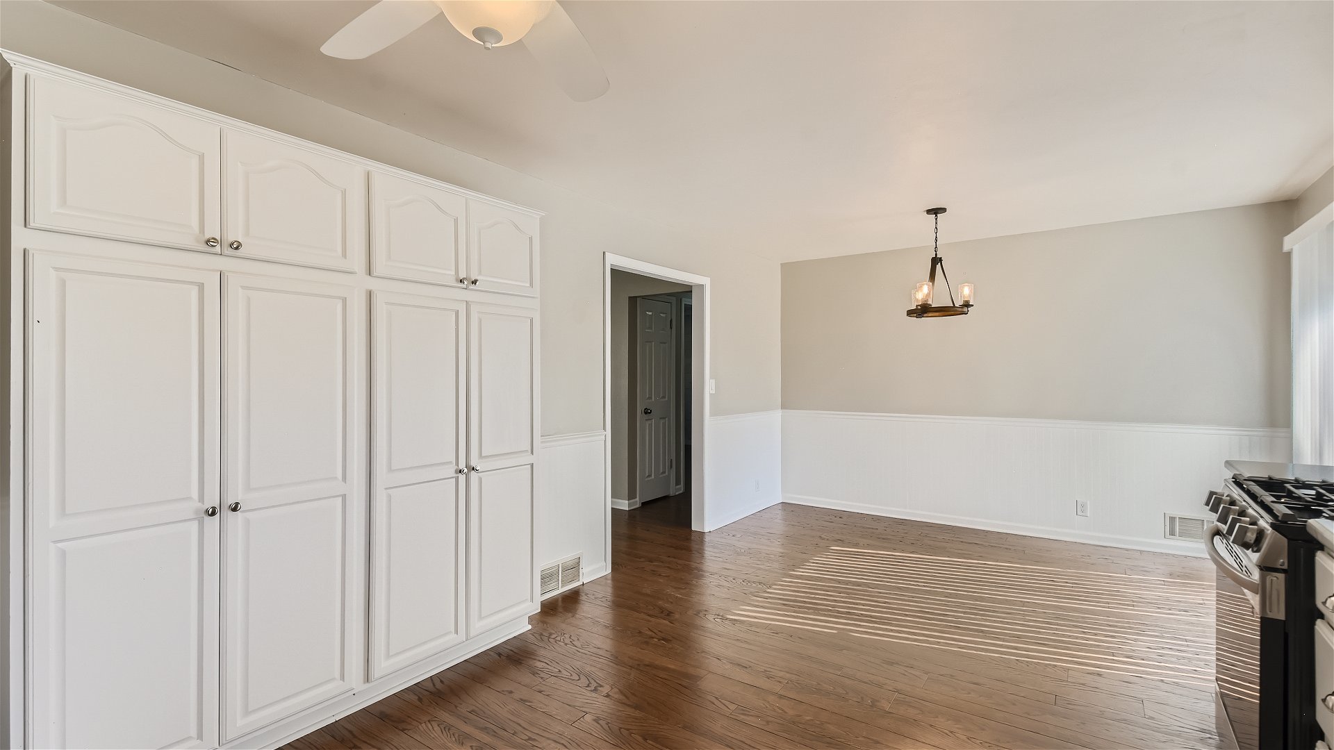 2438 Erskine Road Joliet, IL 60433 - Photo 10 of 42 a view of an empty room with wooden floor