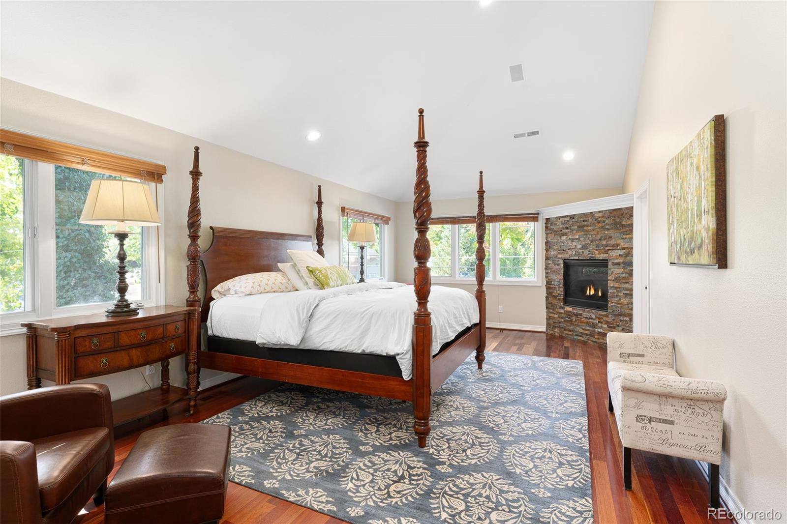 2435 South Fillmore Street Denver, CO 80210 - Photo 19 of 32 a bed room with a bed window and a chair