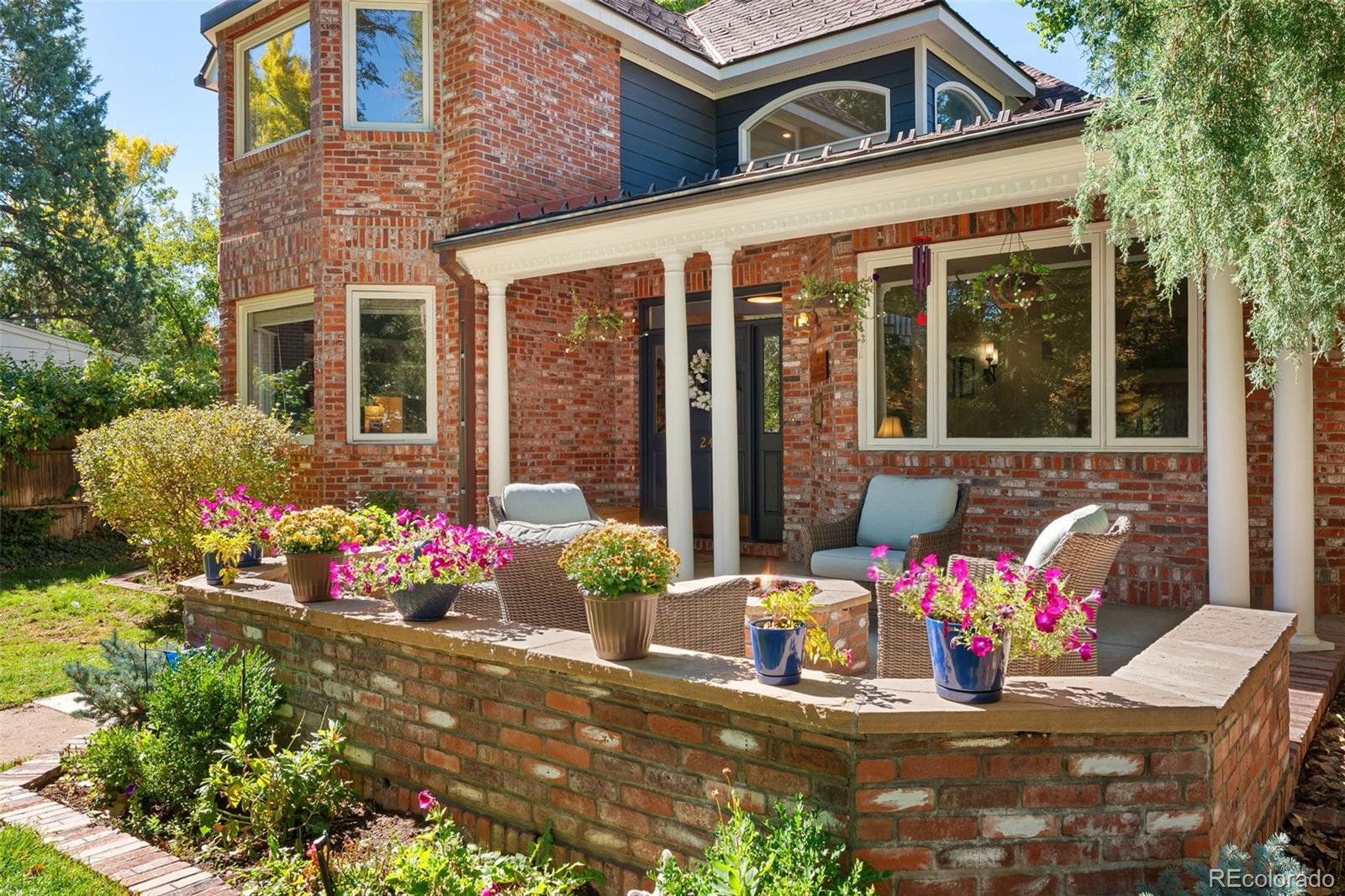 2435 South Fillmore Street Denver, CO 80210 - Photo 2 of 32 a front view of a house