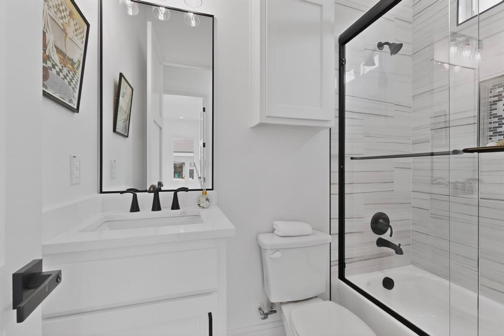9080 County Road 669 Blue Ridge, TX 75424 - Photo 14 of 40 a bathroom with a sink toilet and shower
