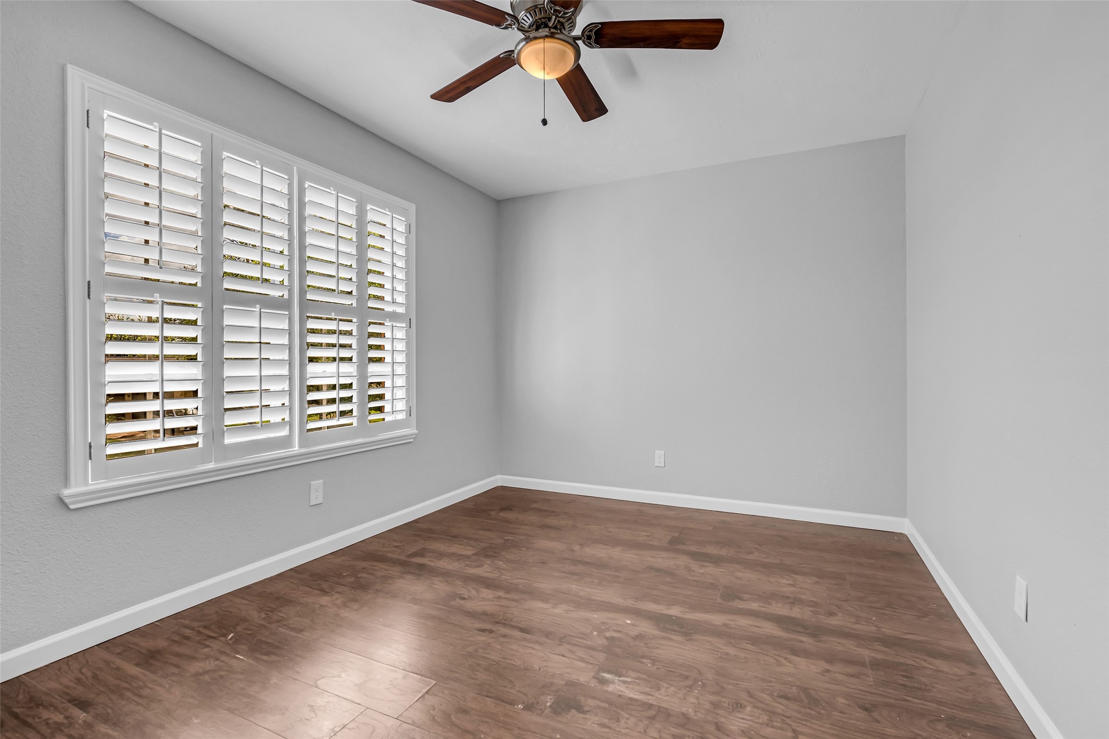 4795 Slade Ben Lane Alvin, TX 77511 - Photo 21 of 25 a view of an empty room with a window