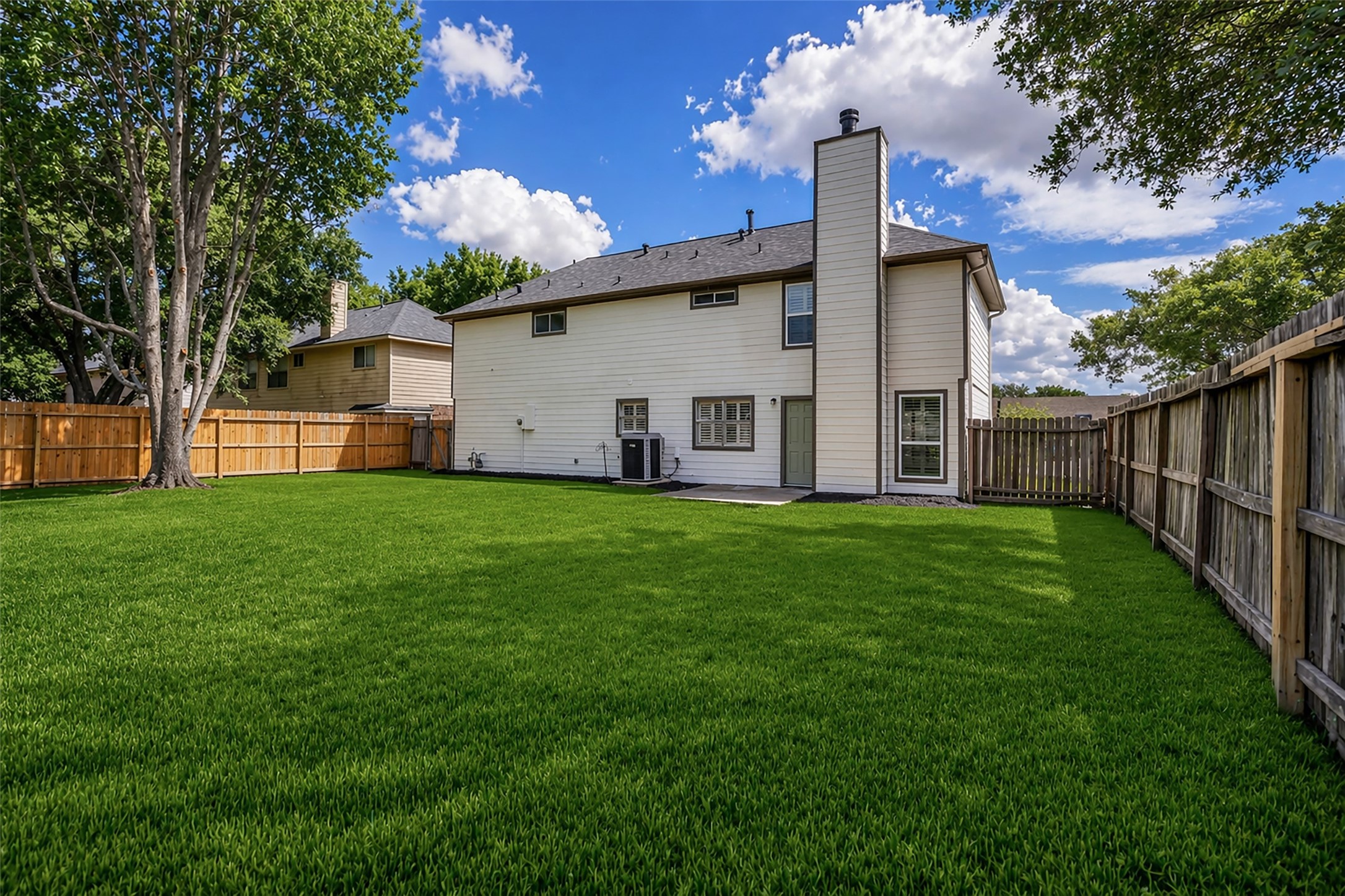 4795 Slade Ben Lane Alvin, TX 77511 - Photo 23 of 25 a front view of house with yard and green space