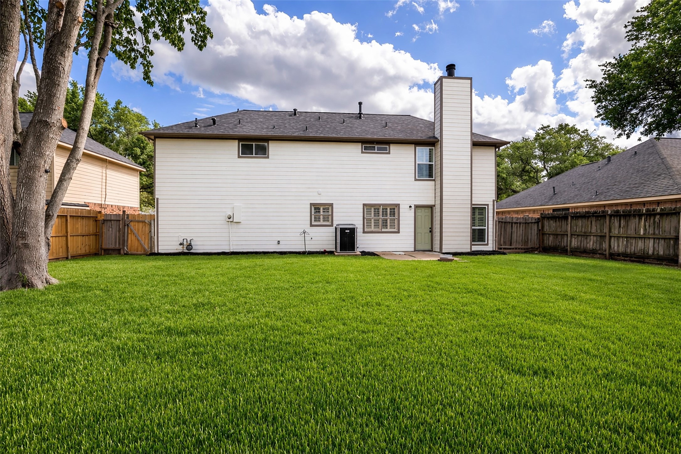 4795 Slade Ben Lane Alvin, TX 77511 - Photo 25 of 25 a view of a house with backyard and garden