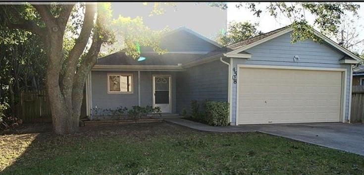 4508 15th Street Bacliff, TX 77518 - Photo 1 of 17 a front view of a house with garden