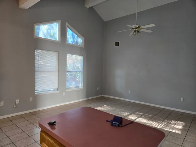 an empty room with windows