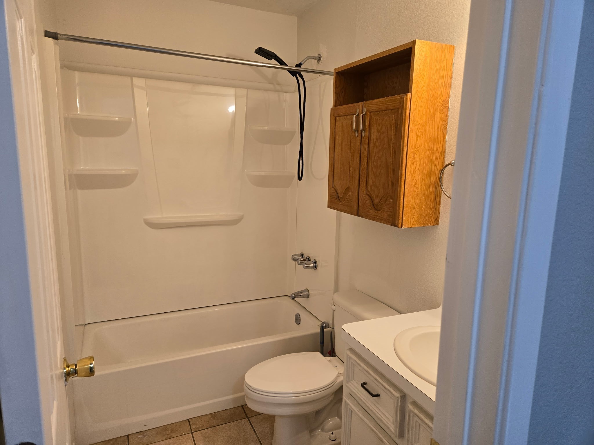 4508 15th Street Bacliff, TX 77518 - Photo 15 of 17 a bathroom with a shower a toilet and a sink